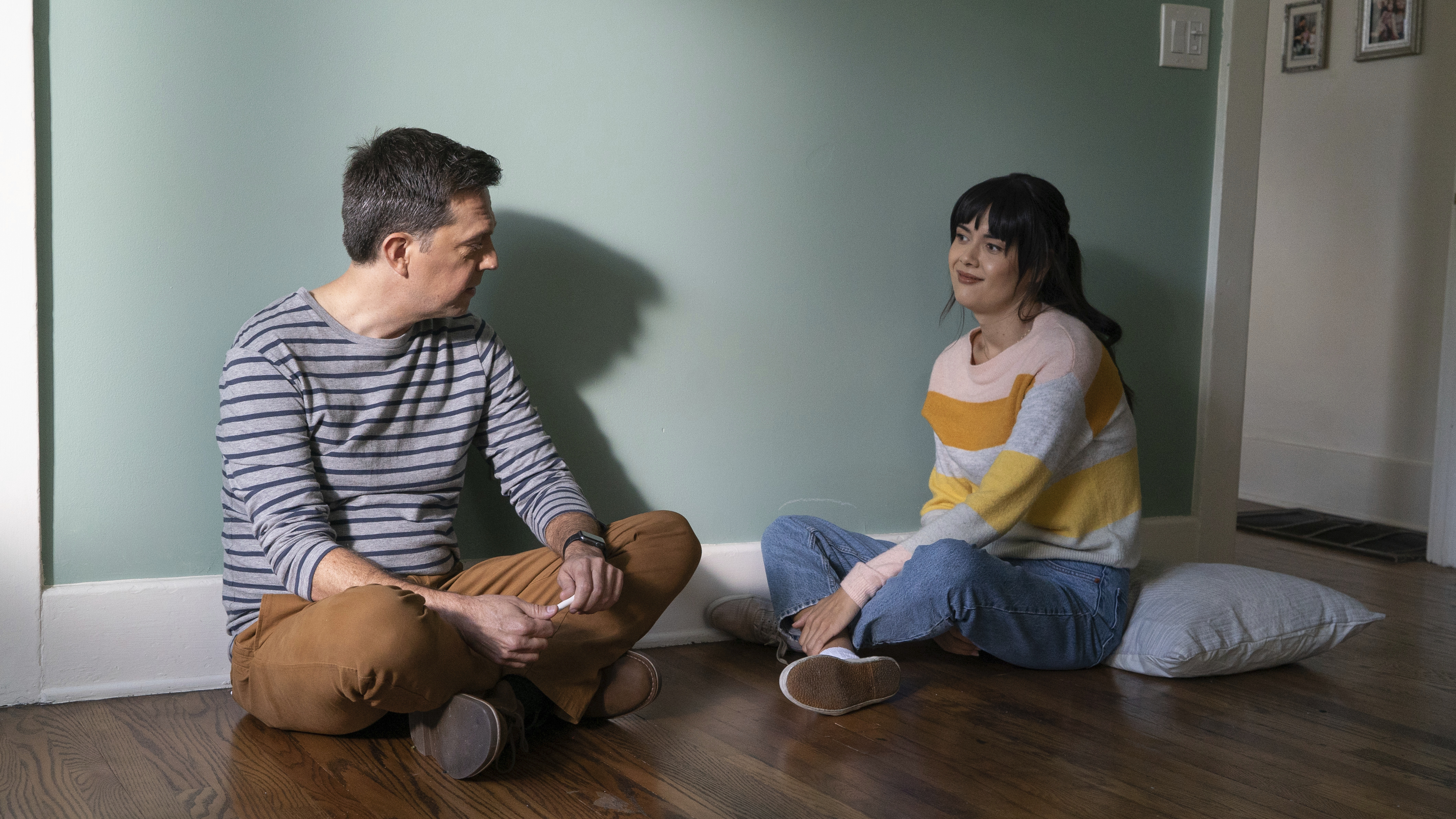 Ed Helms and Patti Harrison in "Together Together."