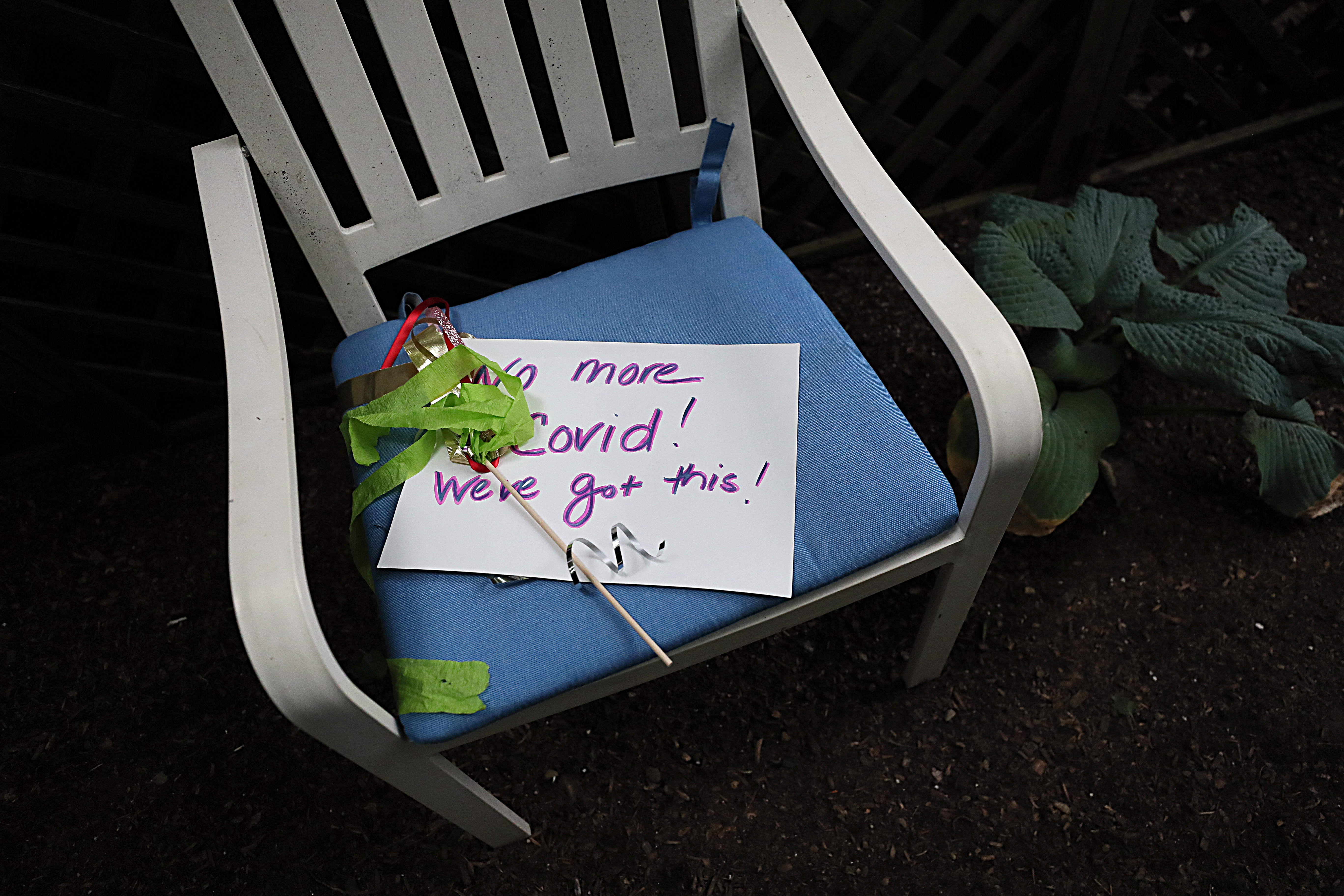 A well wisher's sign in the yard of Frank Cutitta's home.