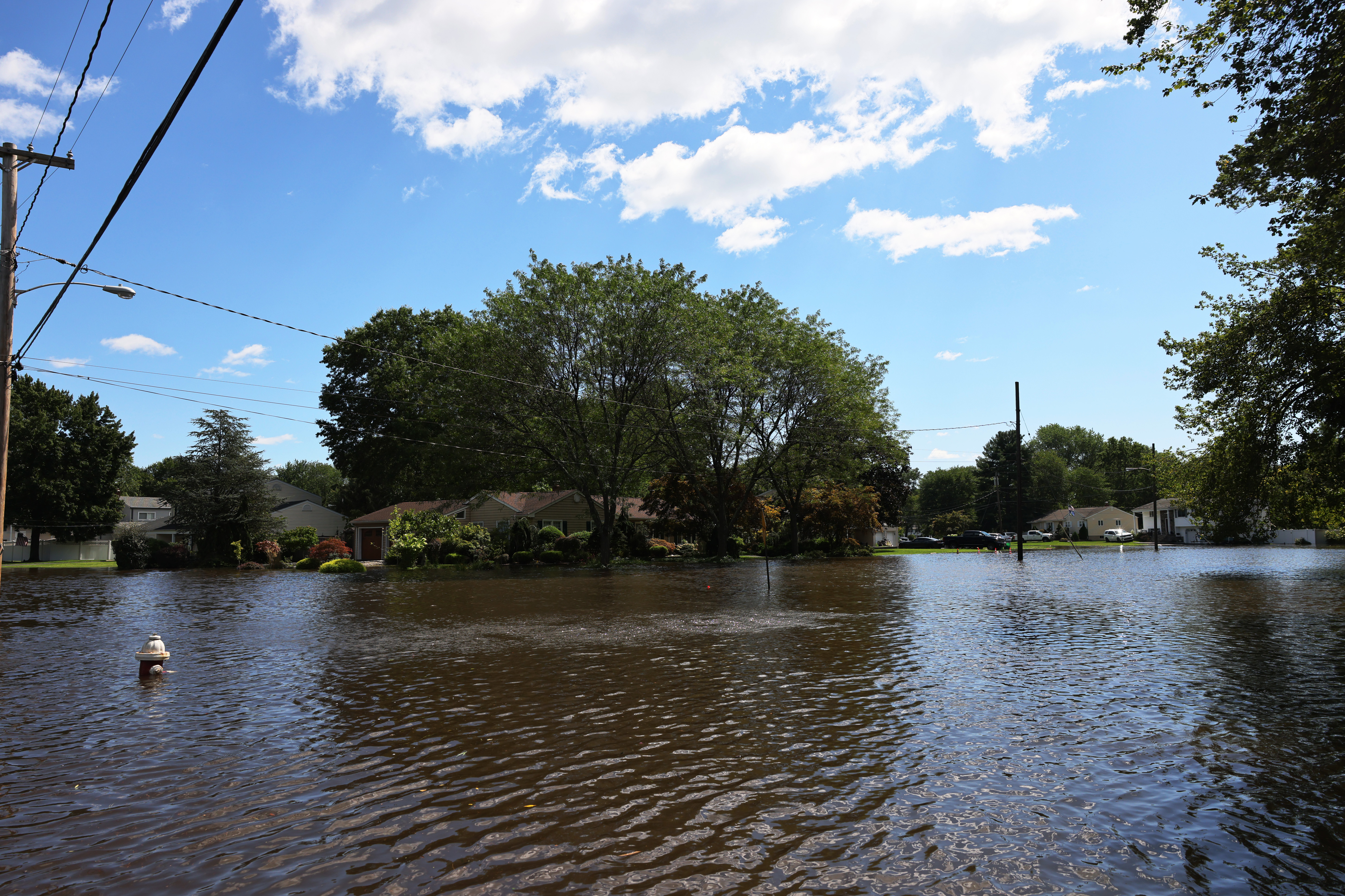 River water flooded West Williams Street on Thursday in Lincoln Park, New Jersey.