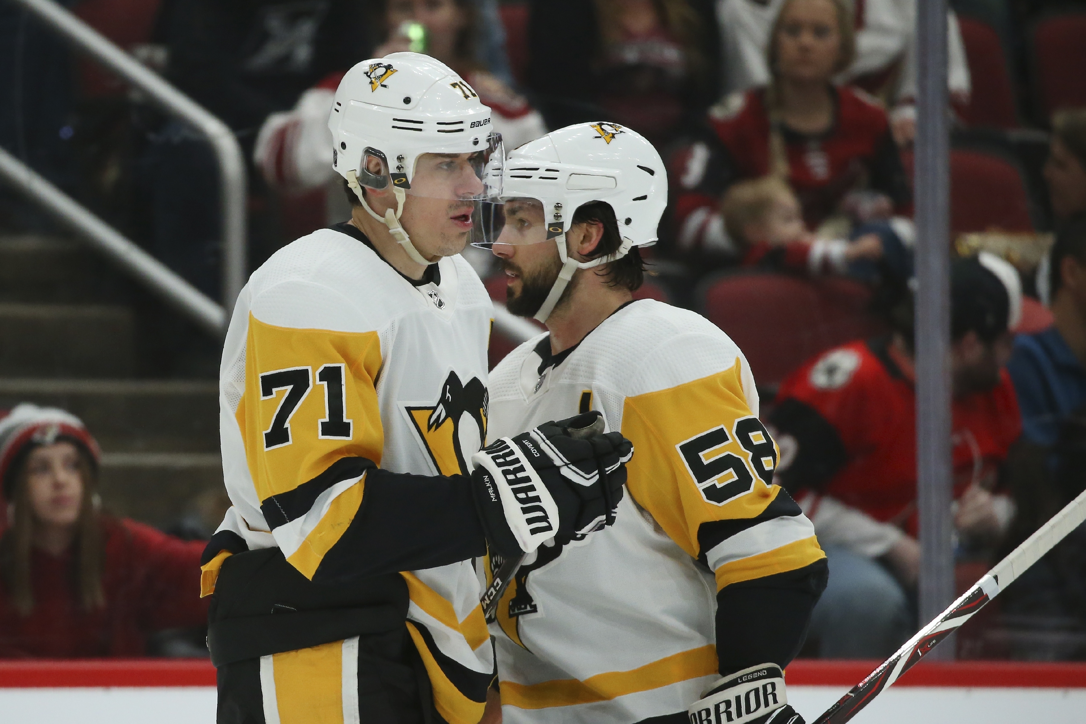Evgeni Malkin (left) and Kris Letang are likely to stay put in Pittsburgh.