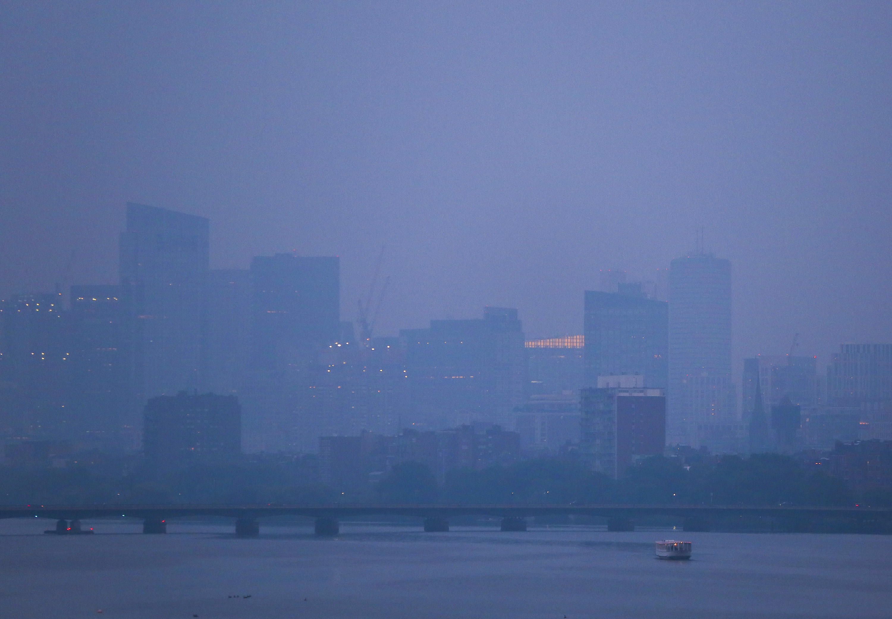 Haze from the California wildfires blanketed the Boston area on July 26.