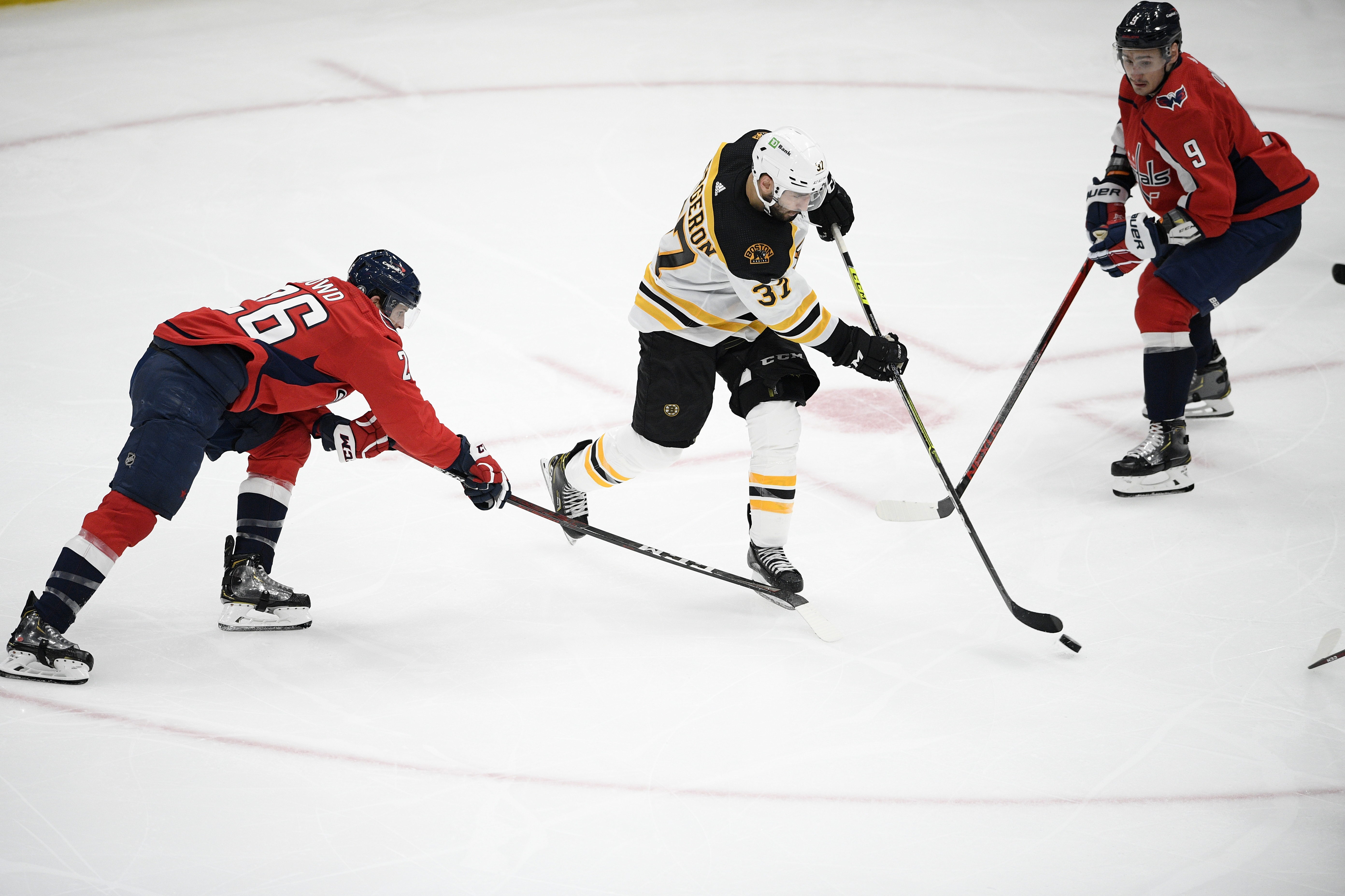 Patrice Bergeron looks for an opening in the third period Sunday night. His two goals provided all the offense Boston would need in the 3-1 win.