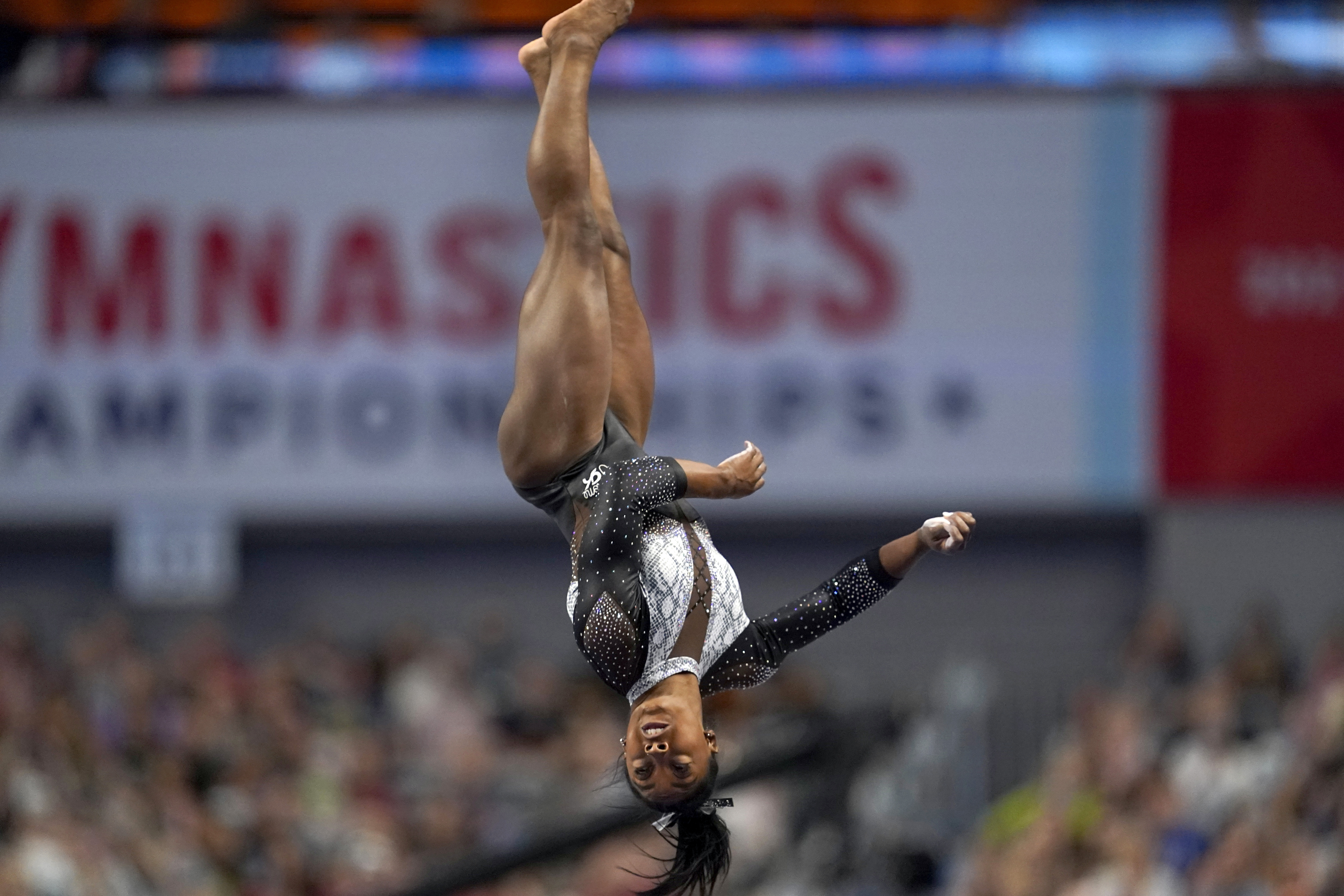 Simone Biles competes on the vault during Sunday's action.