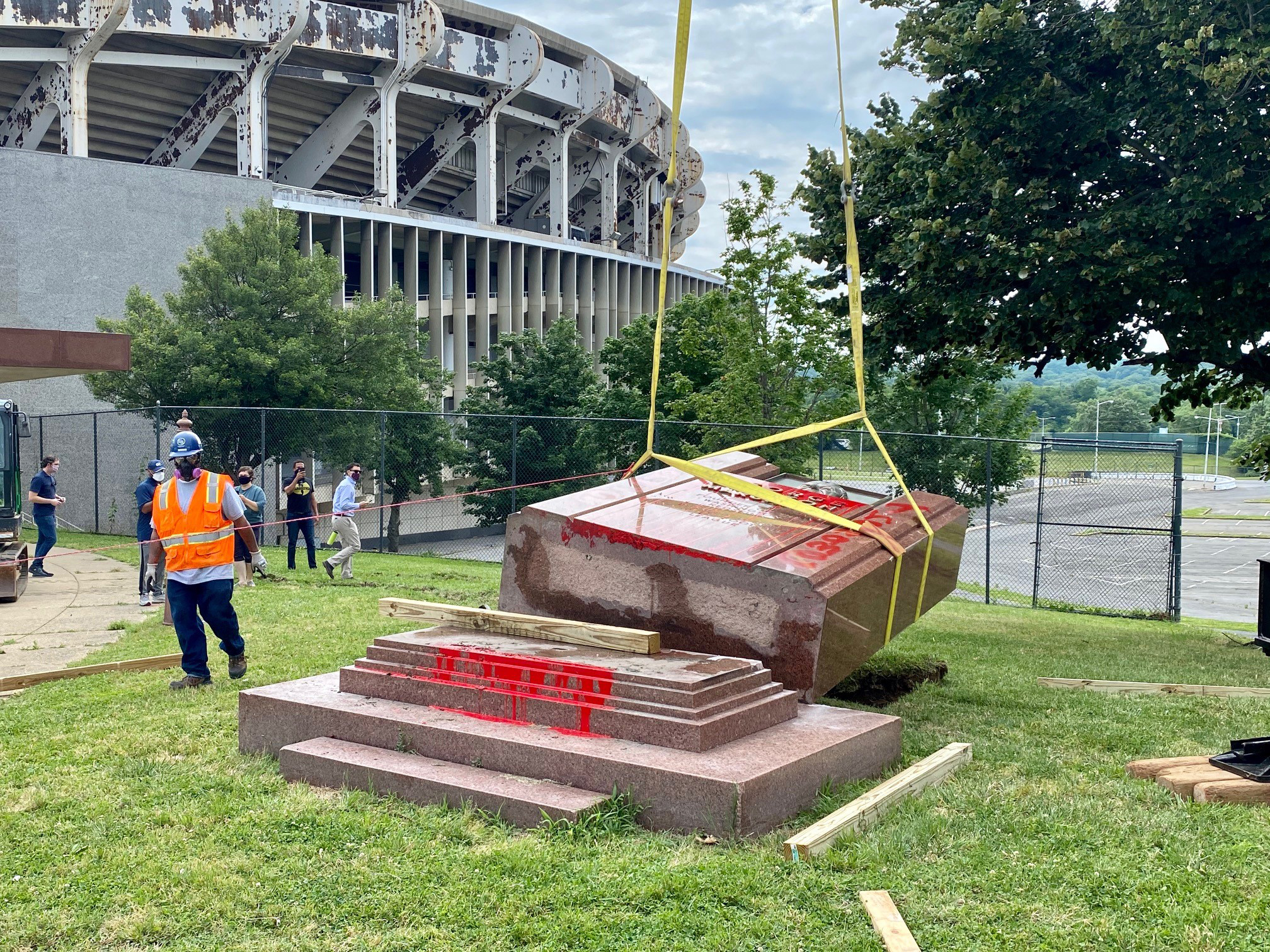 Workers removed the George Preston Marshall monument outside RFK Stadium.