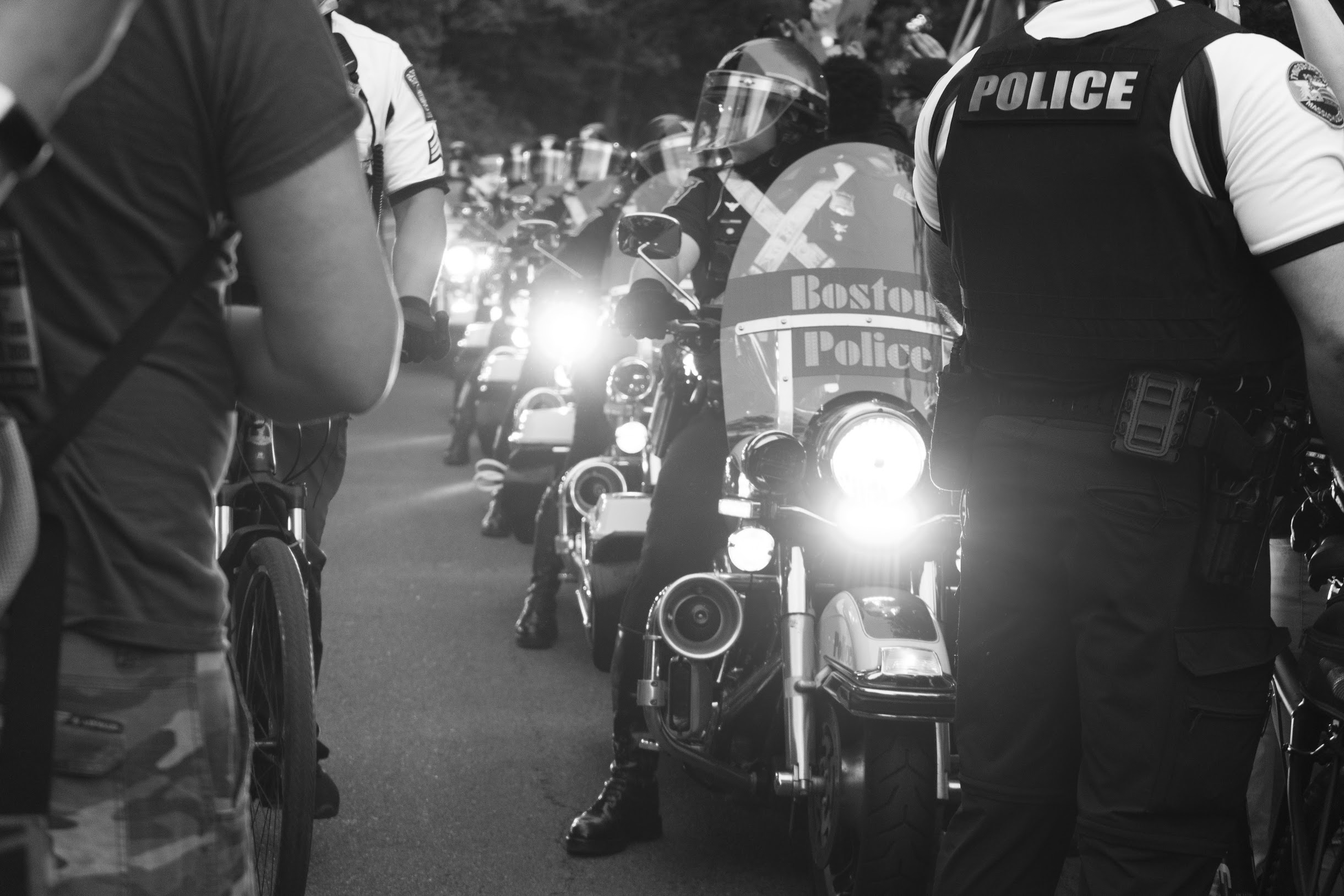 A photo by OJ Slaughter of Boston Police parking their motorcycles after they rode through a peaceful group of protesters after a Black Lives Matter vigil at Franklin Park on June 2.