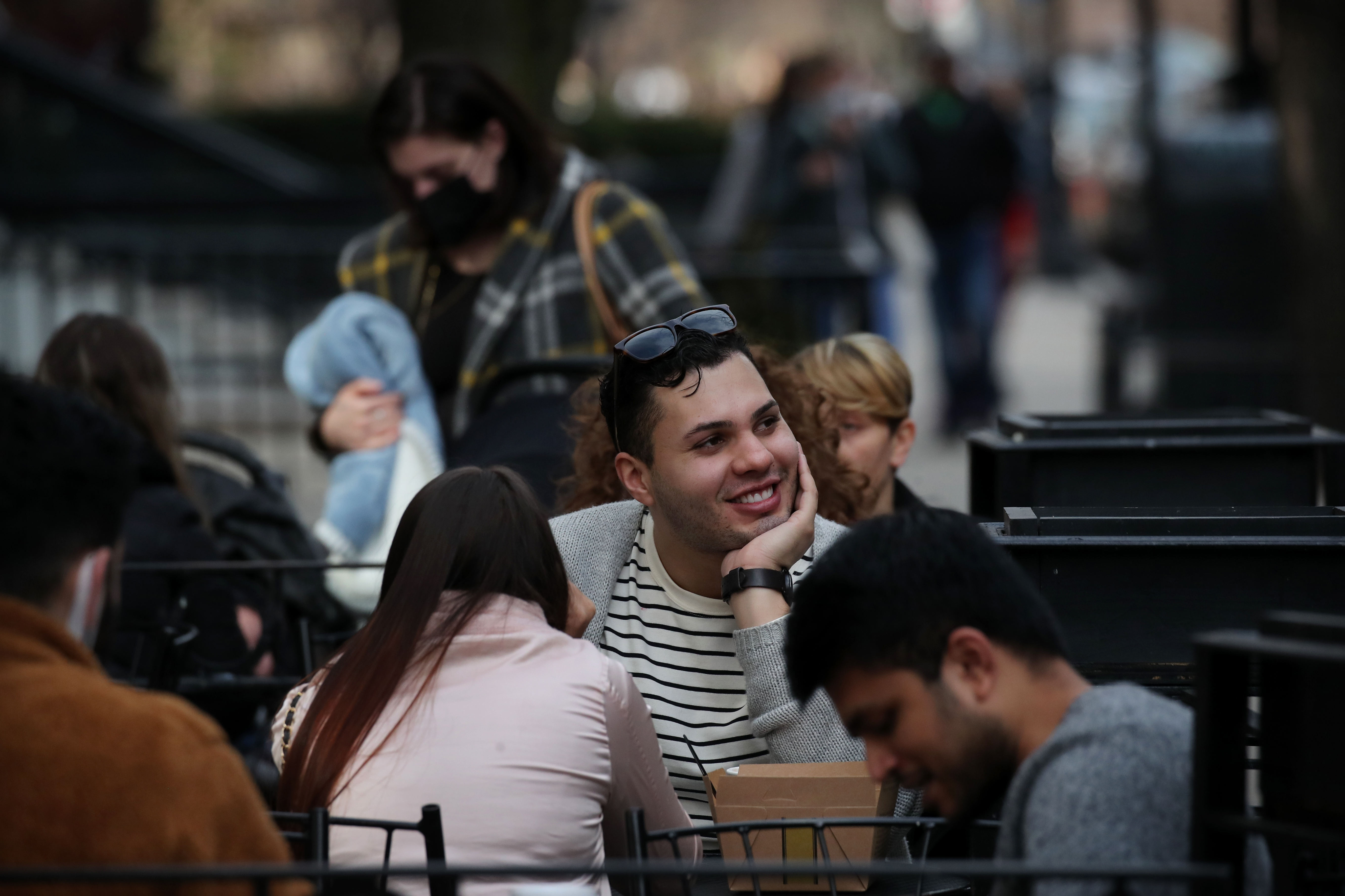 Johan Lopez talked with his sister, Sophia, while having coffee outside the Thinking Cup on Newbury Street in Boston on Thursday.
