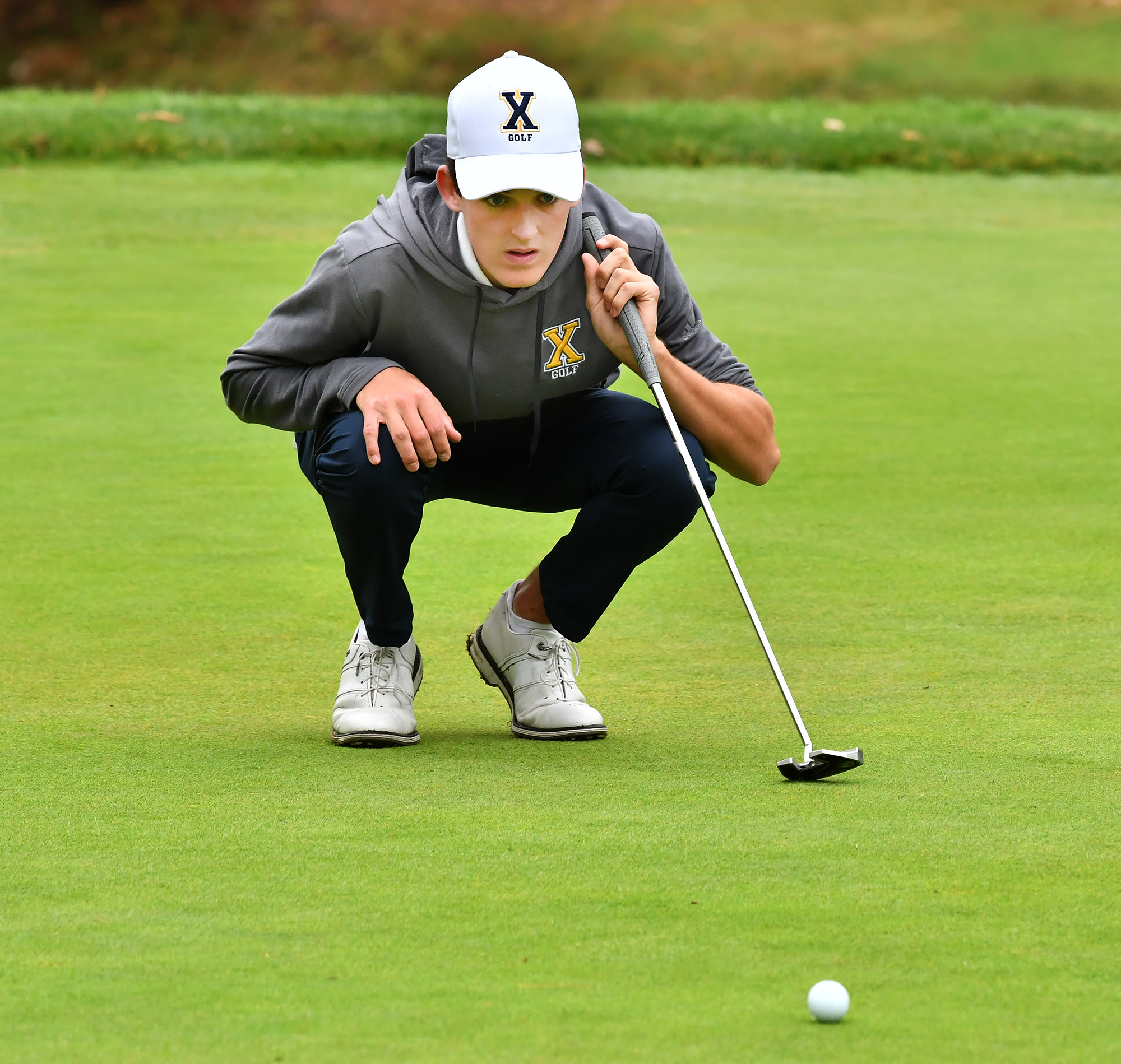 Ryan Scollins steps into No. 1 role and leads Xaverian golf back