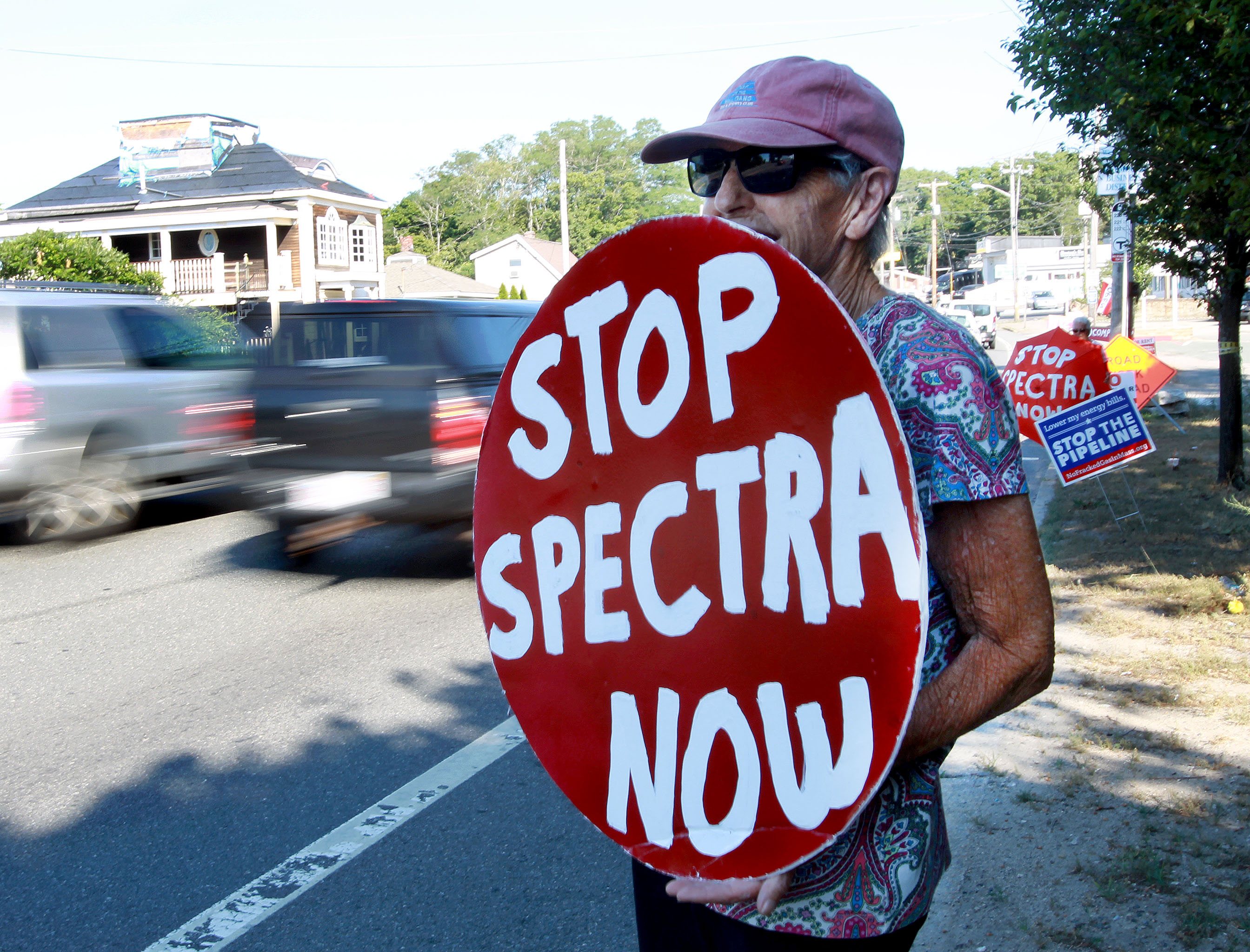 Dotty Anderson of Weymouth joined protesters along the roadway off the Fore River Bridge in the summer of 2016.
