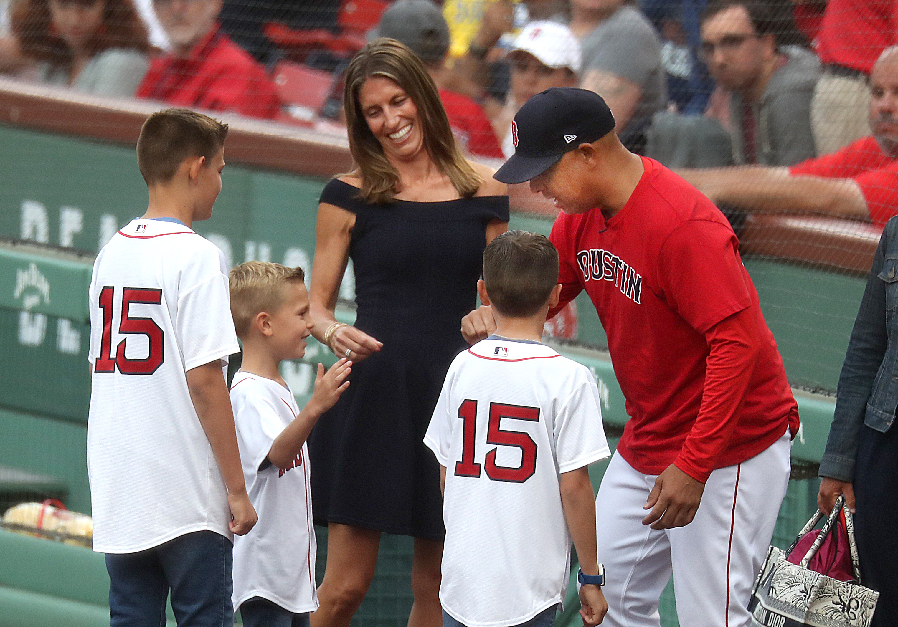 Kelli Pedroia, far left, wife of Red Sox second baseman Dustin News  Photo - Getty Images