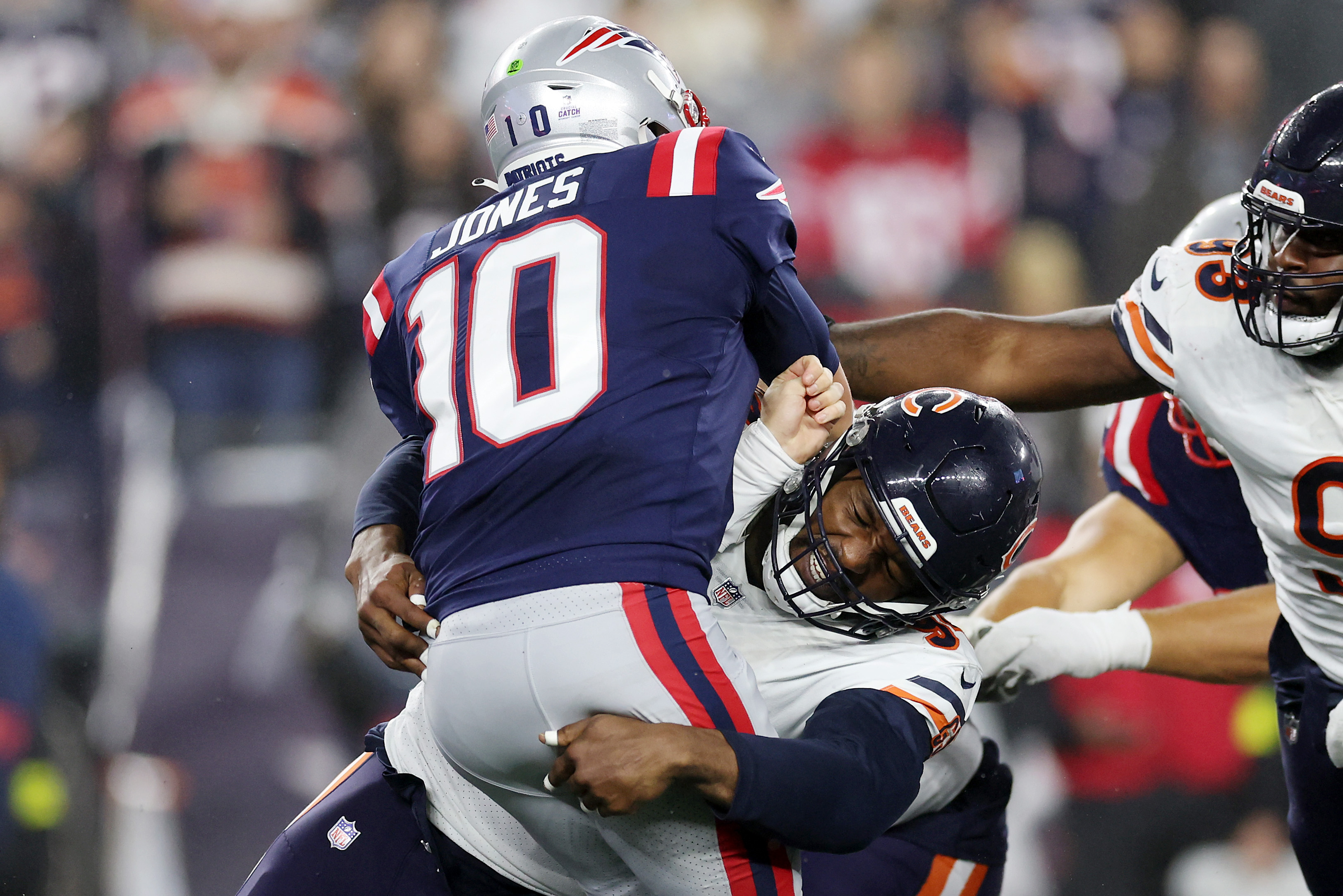 FILE - Chicago Bears defensive end Robert Quinn (94) rushes during the  first half of an NFL football game against the New England Patriots,  Monday, Oct. 24, 2022, in Foxborough, Mass. The