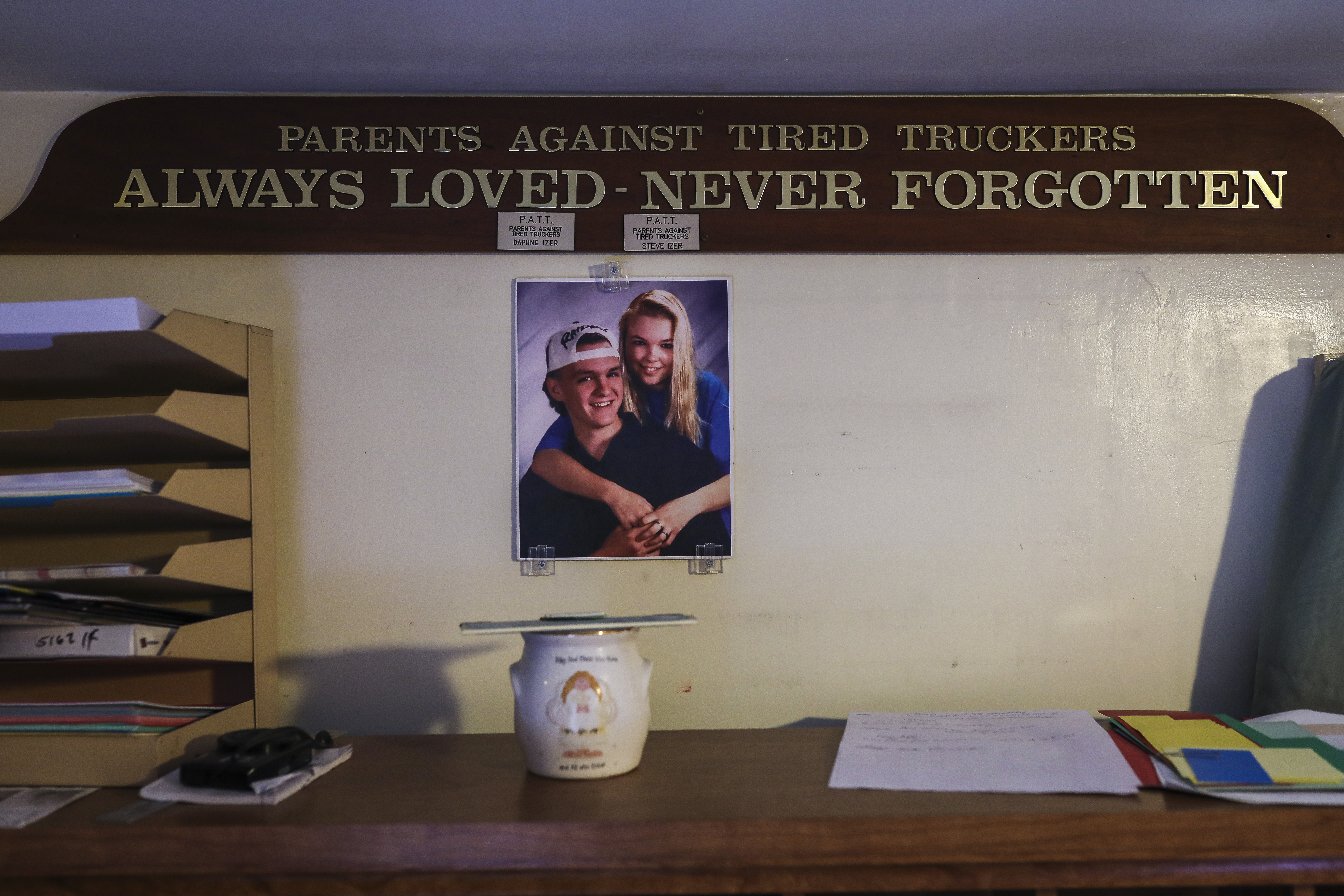 A photo of 17-year-old Jeff Izer and his girlfriend Angie Dubuc in the office of Daphne and Steve Izer. Recently, the couple wrote to Joe Biden and asked him to do more to prevent road fatalities involving large trucks.