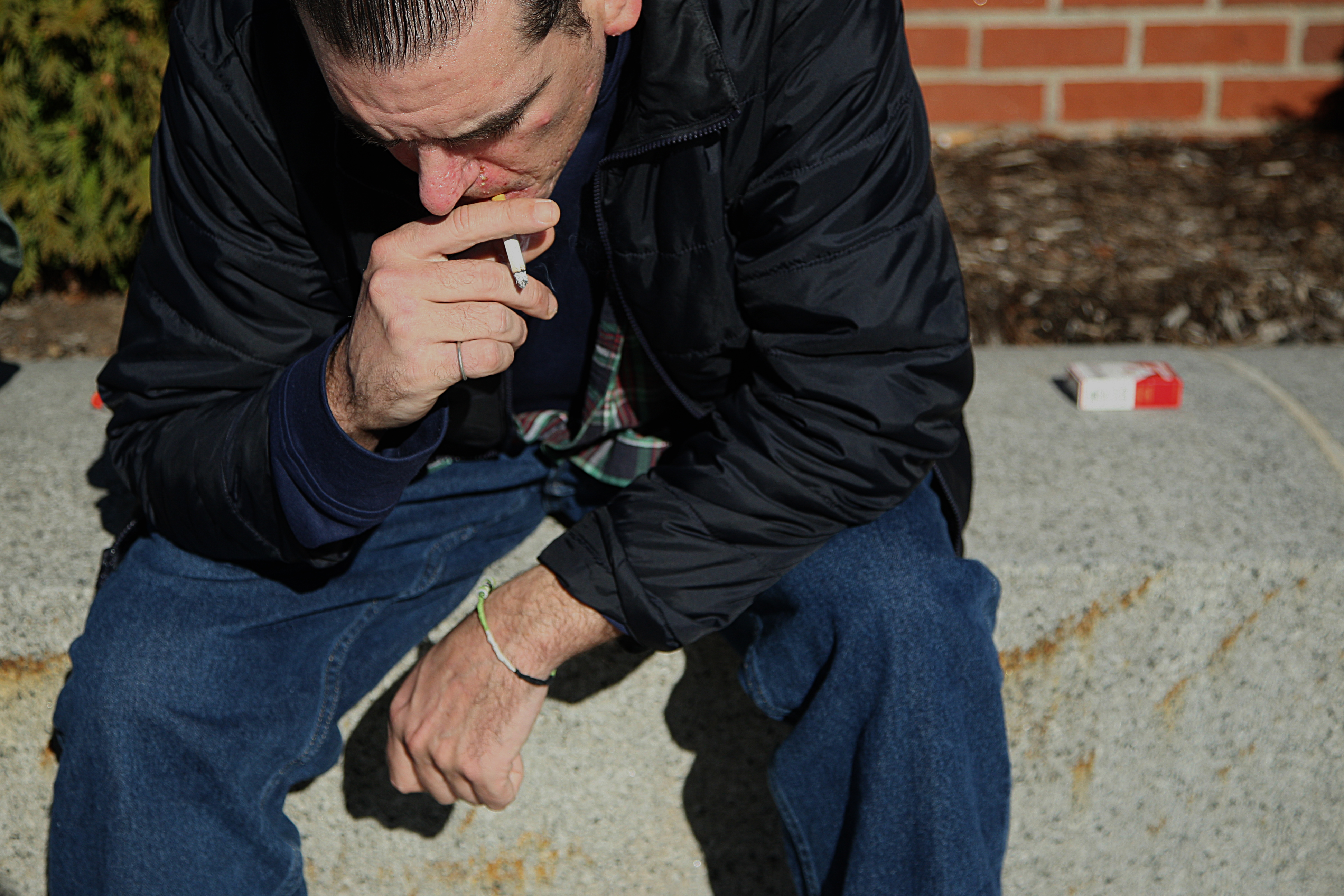 Mike took a moment for a quiet cigarette after the court released him from Worcester.