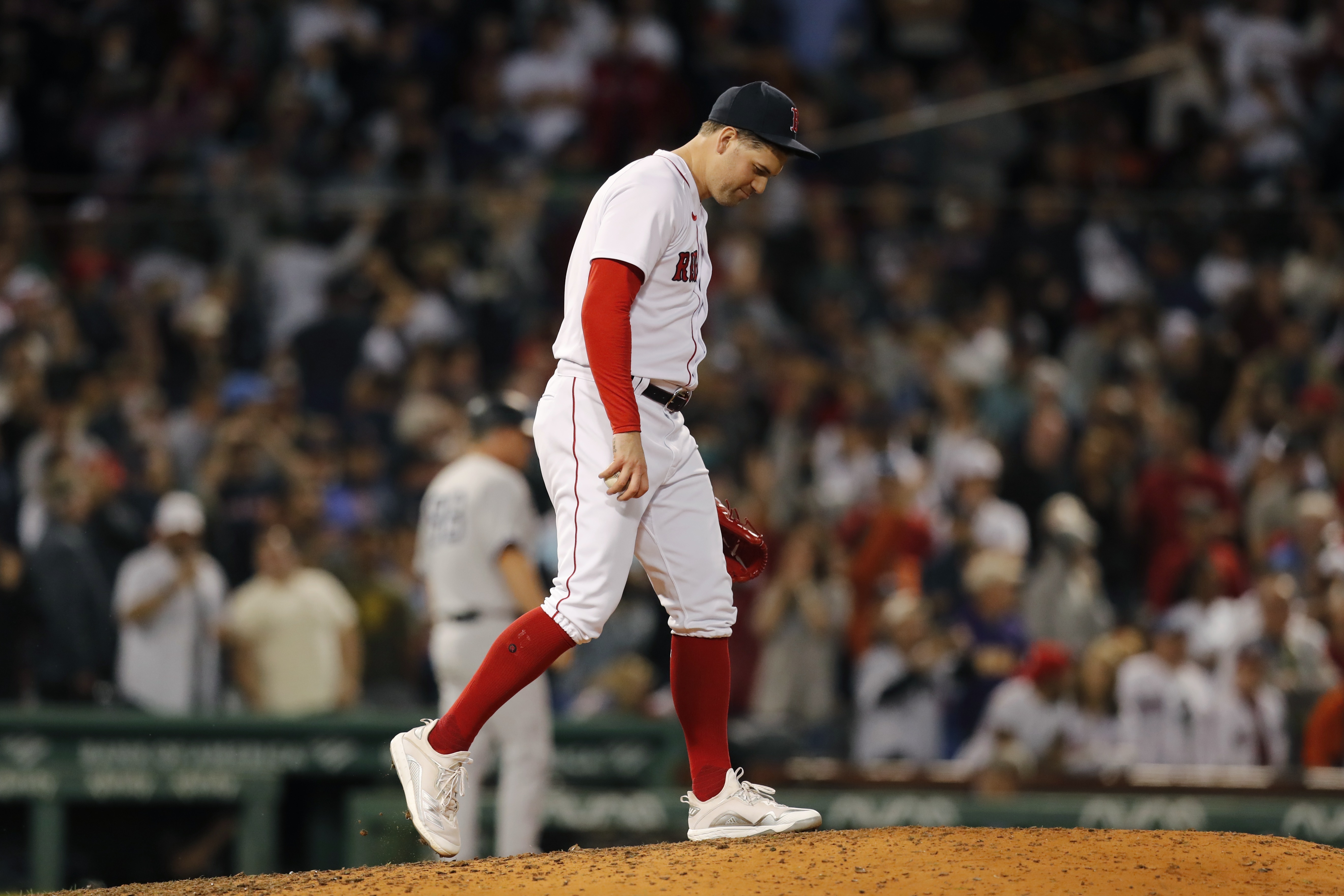 Adam Ottavino bows his head after giving up a two-run homer to Giancarlo Stanton Sunday night at Fenway.