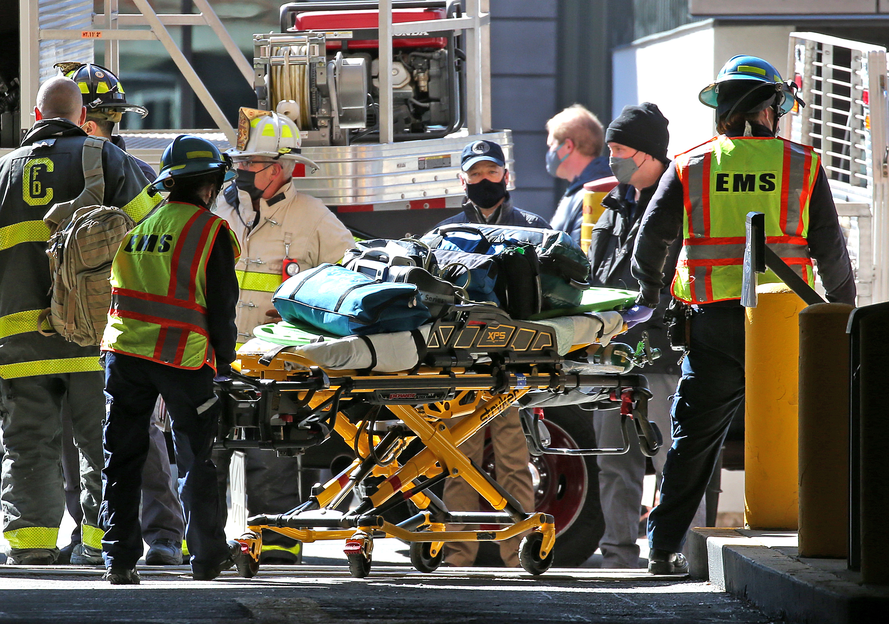The names of the construction workers involved in Wednesday's stairwell collapse were not released.