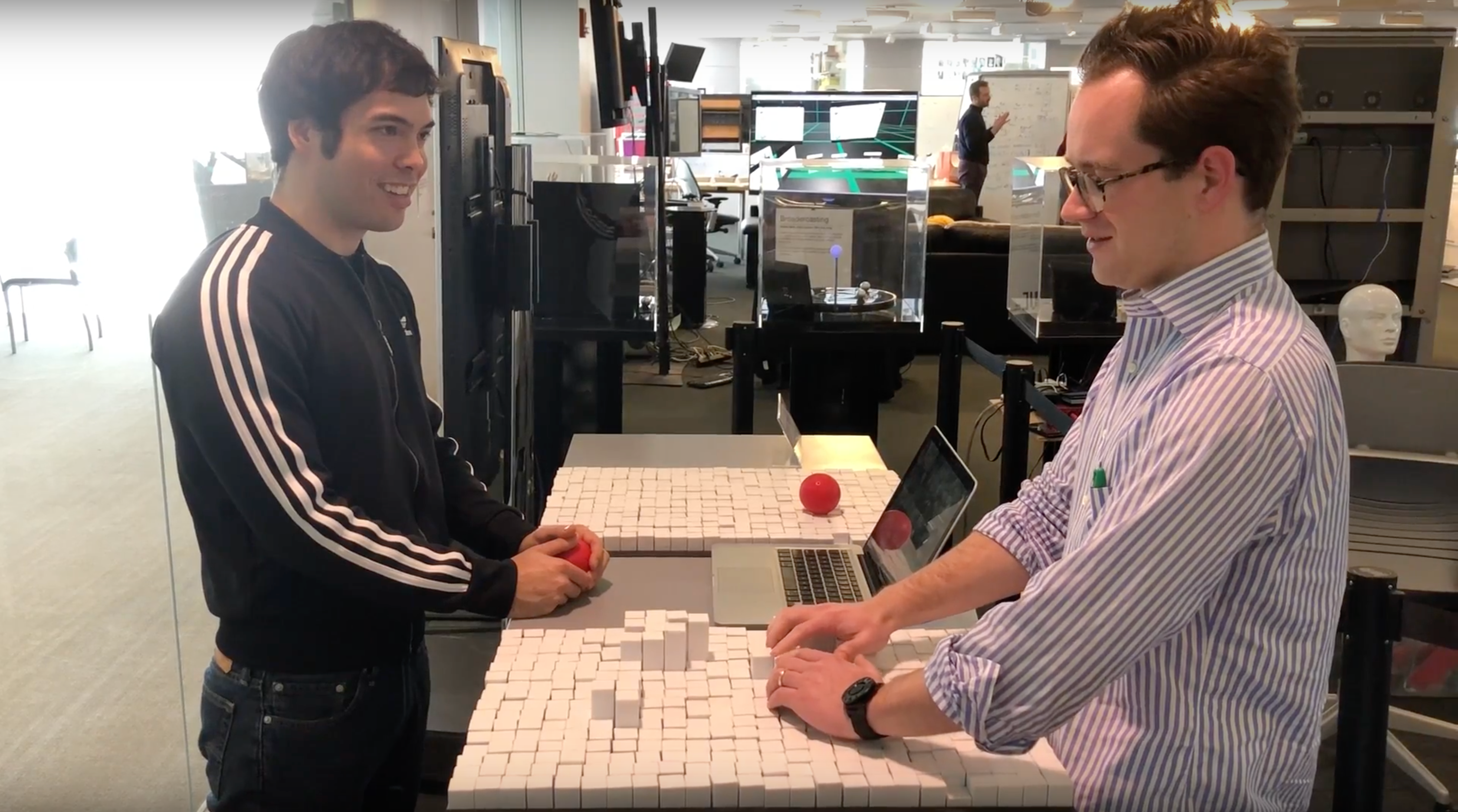 In 2018, Daniel Levine (left), then a master’s student at MIT’s Tangible Media Group in Cambridge, worked on the TRANSFORM device at the lab along with computer scientist Woodbury Shortridge (right).