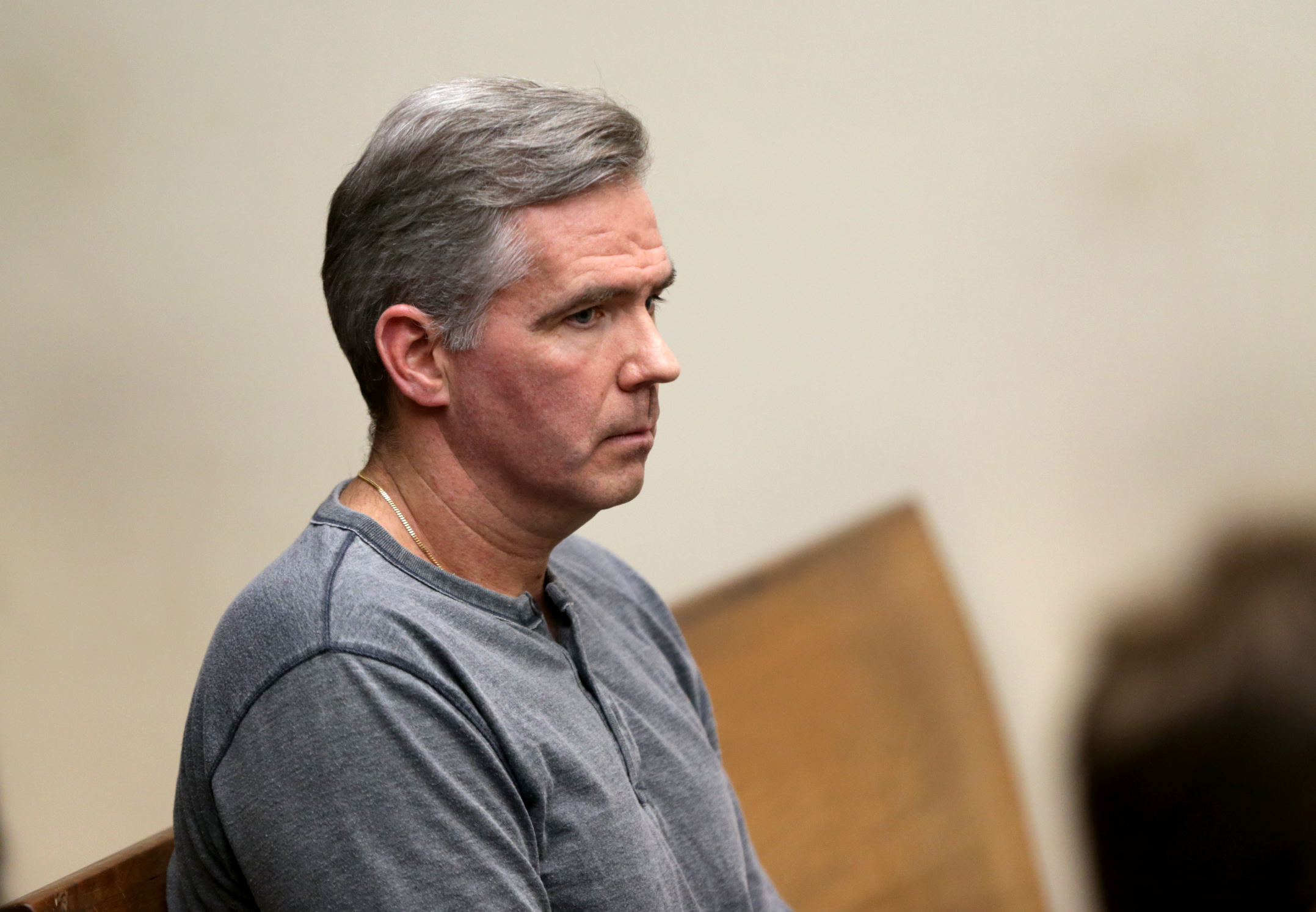 Boston Police Captain Timothy Connolly waited to be called at his arraignment in Quincy District Court on Feb. 8, 2019.