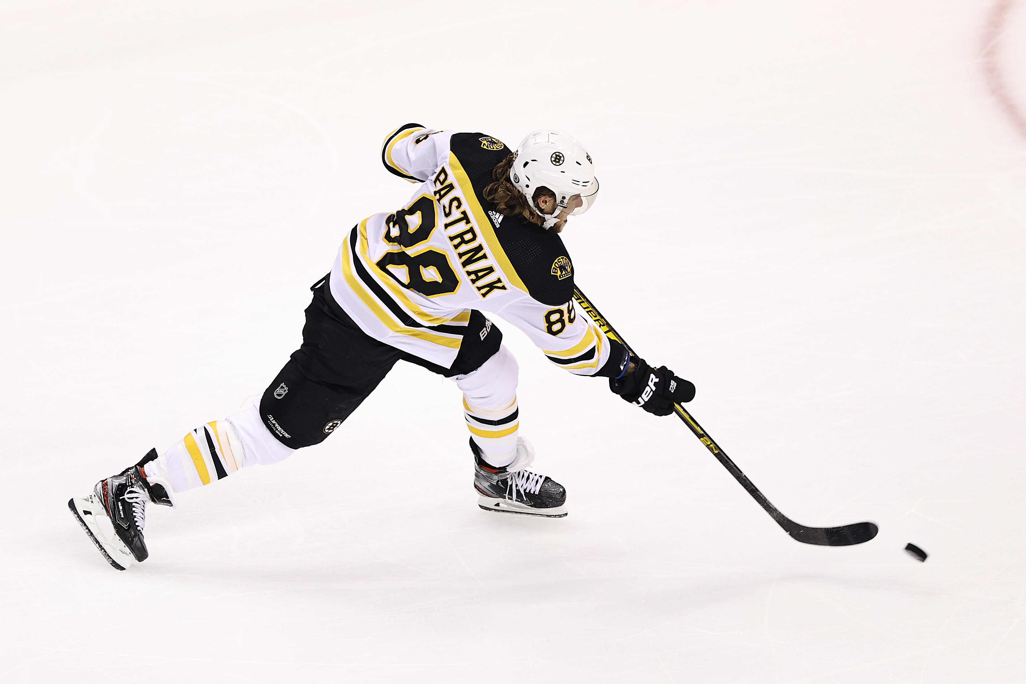 David Pastrnak blasts one during the first period of Sunday's game.