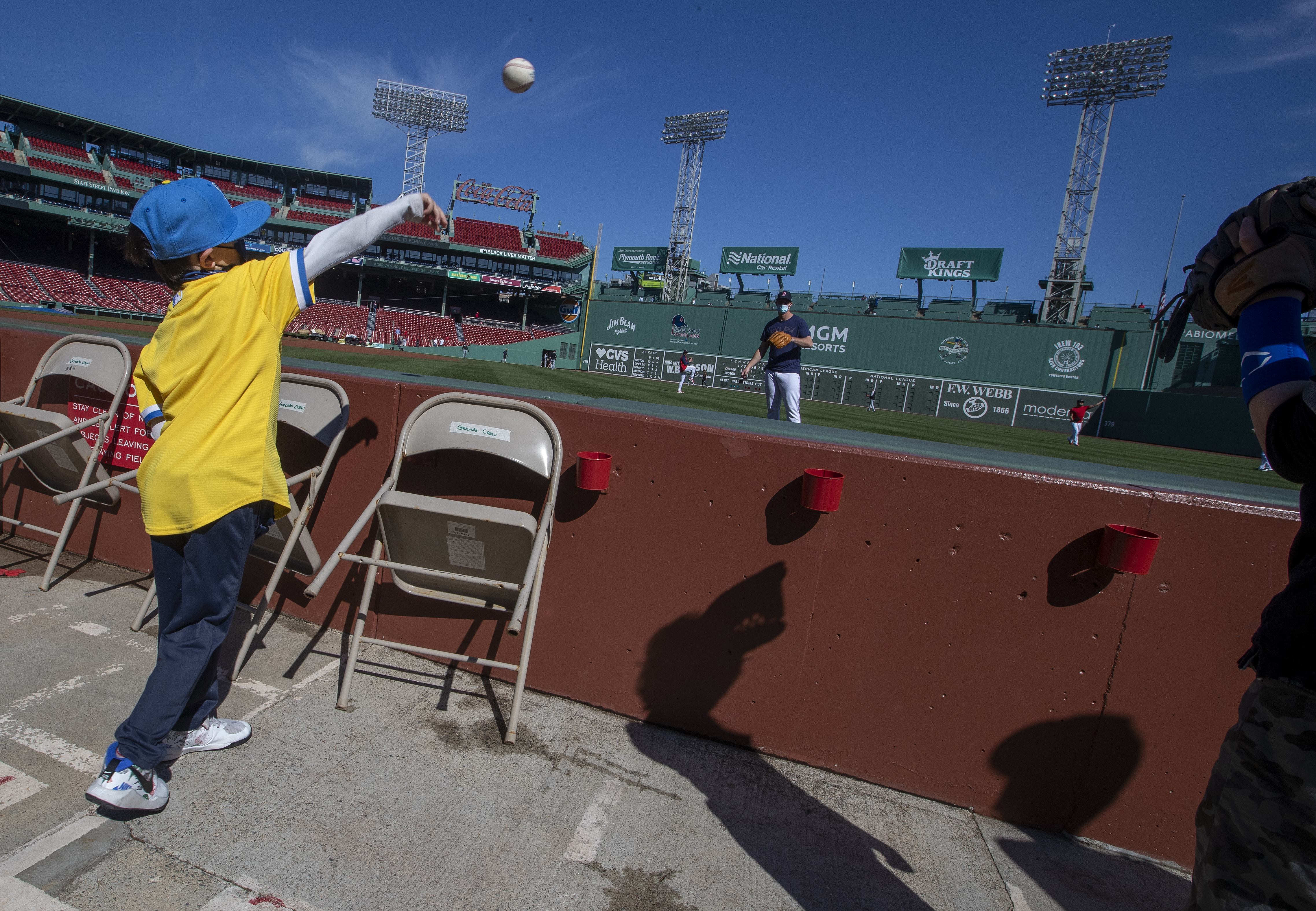 Aiguier, 7, played catch with Red Sox pitcher Austin Brice before Monday's Patriots Day game.
