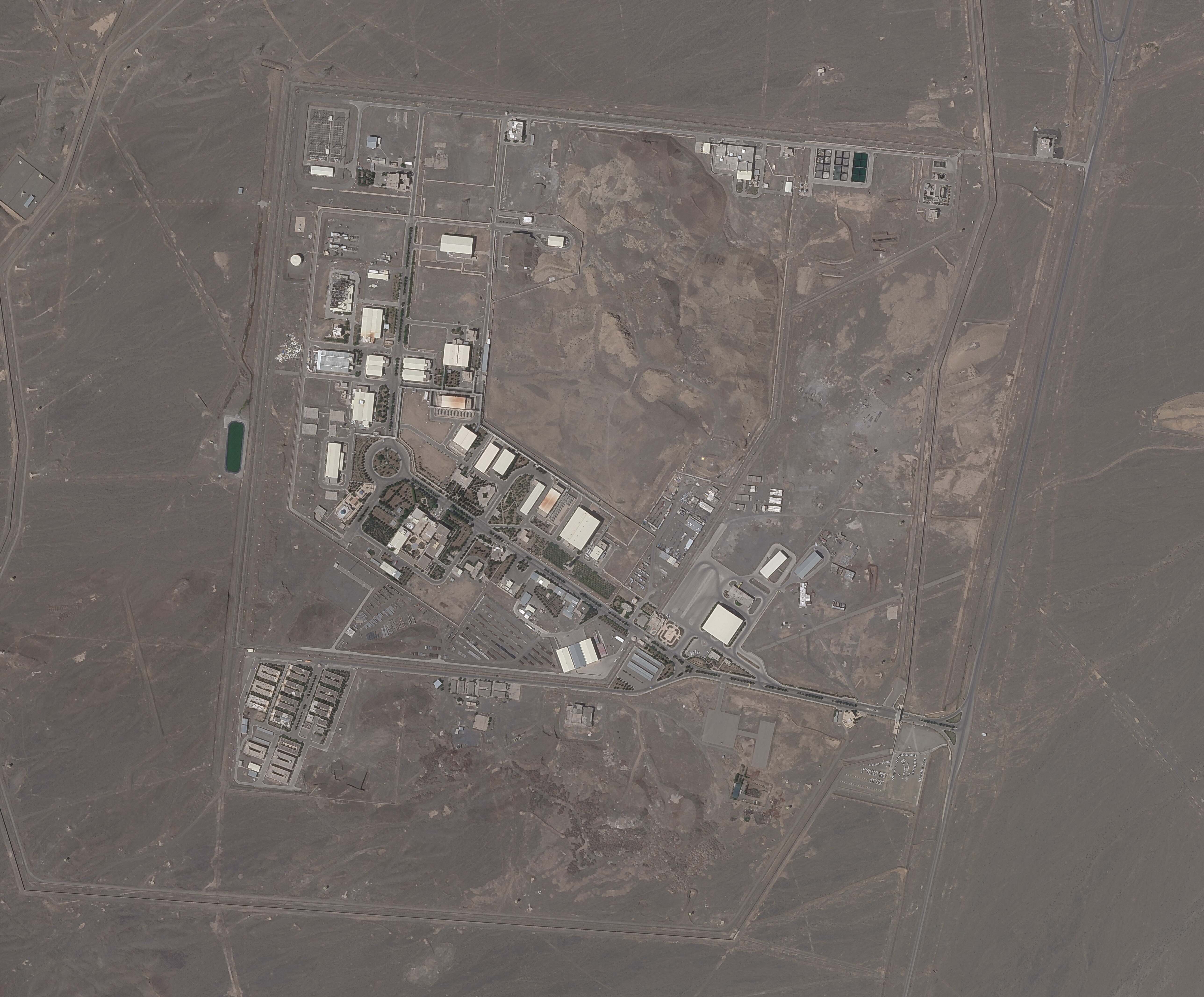 This satellite photo provided from Planet Labs Inc. shows Iran's Natanz nuclear facility on Wednesday. Iran began enriching uranium on Friday to its highest level ever at Natanz, edging closer to weapons-grade levels to pressure talks in Vienna aimed at restoring its nuclear deal with world powers after an attack on the site.