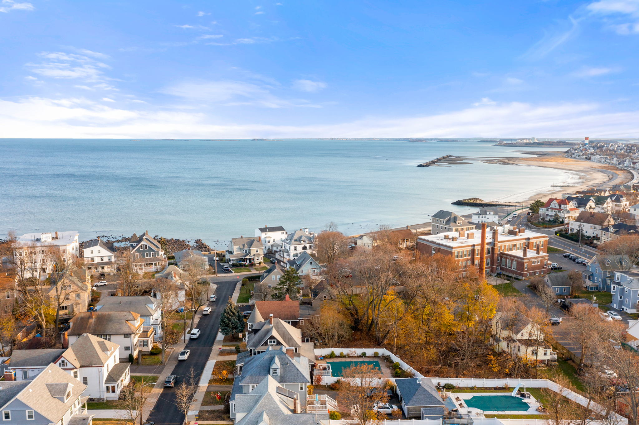 An aerial view of the Victorian home at 24 Temple Ave. in Winthrop and the other neighborhood homes, which have views of Boston Harbor.
