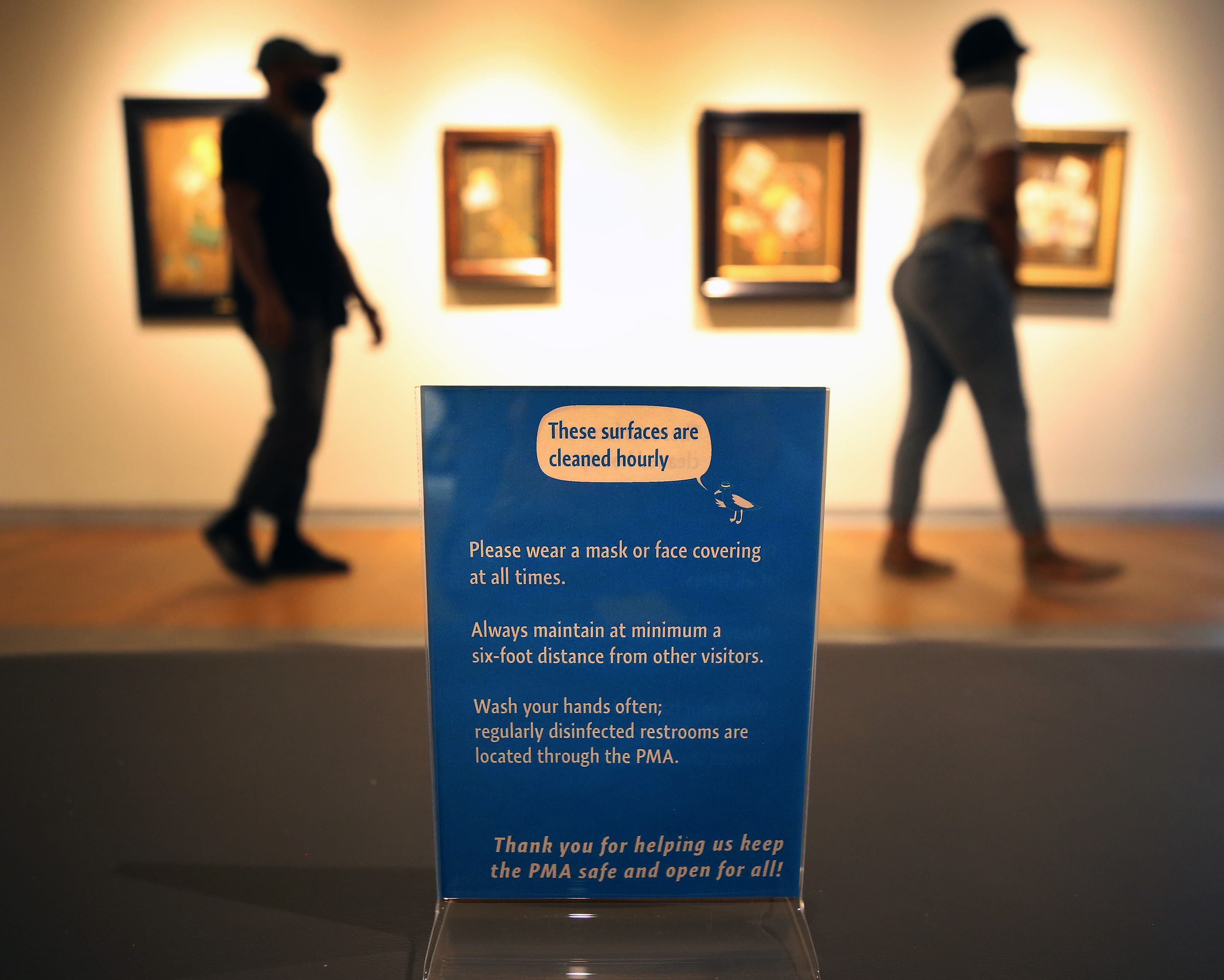 All over the museum, cheery signs remind visitors of safety protocols.