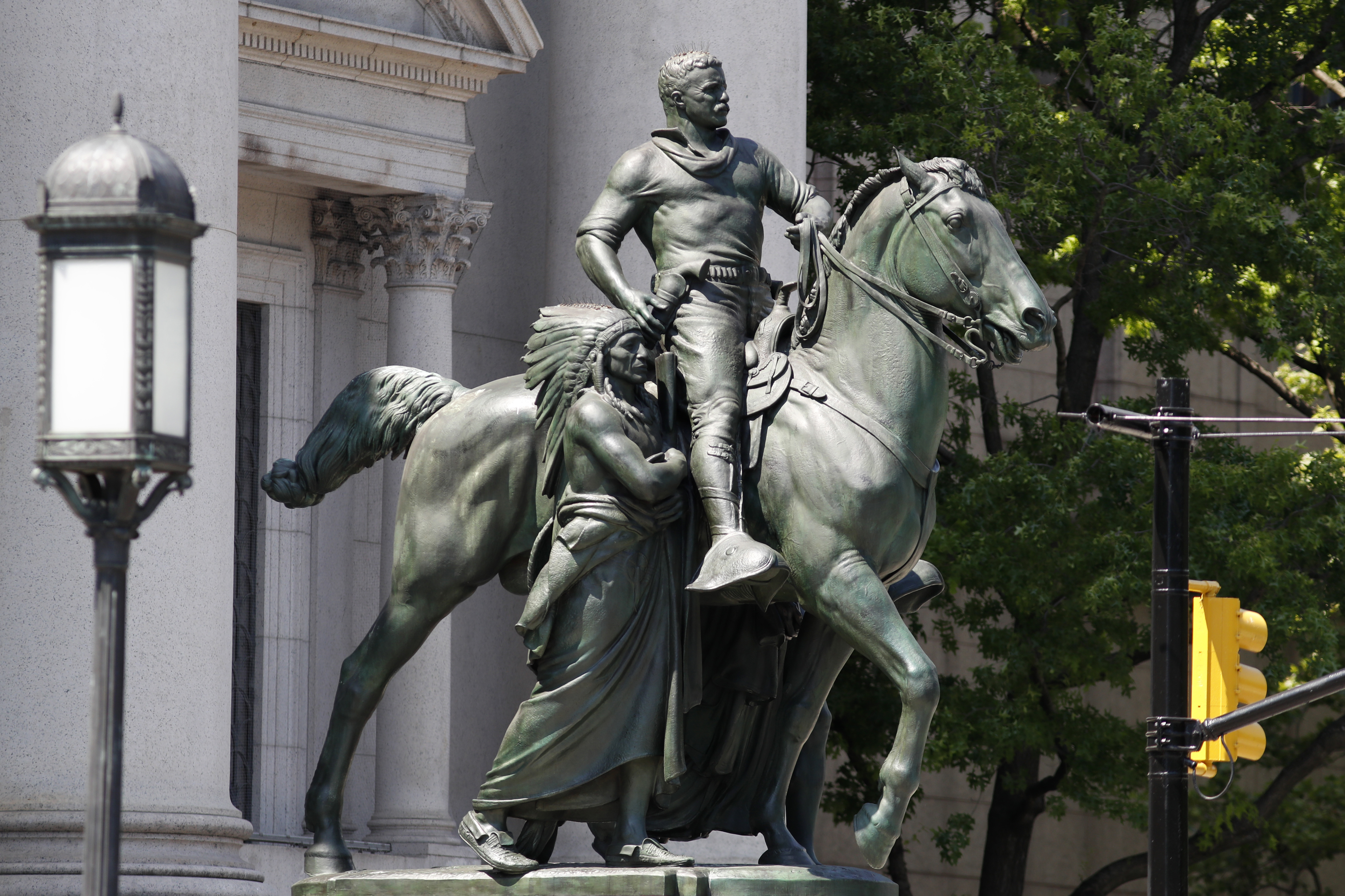 The statue of Theodore Roosevelt outside the Museum of Natural History in New York. The equestrian memorial to Roosevelt, which has long prompted objections as a symbol of Colonialism and racism, will be coming down.