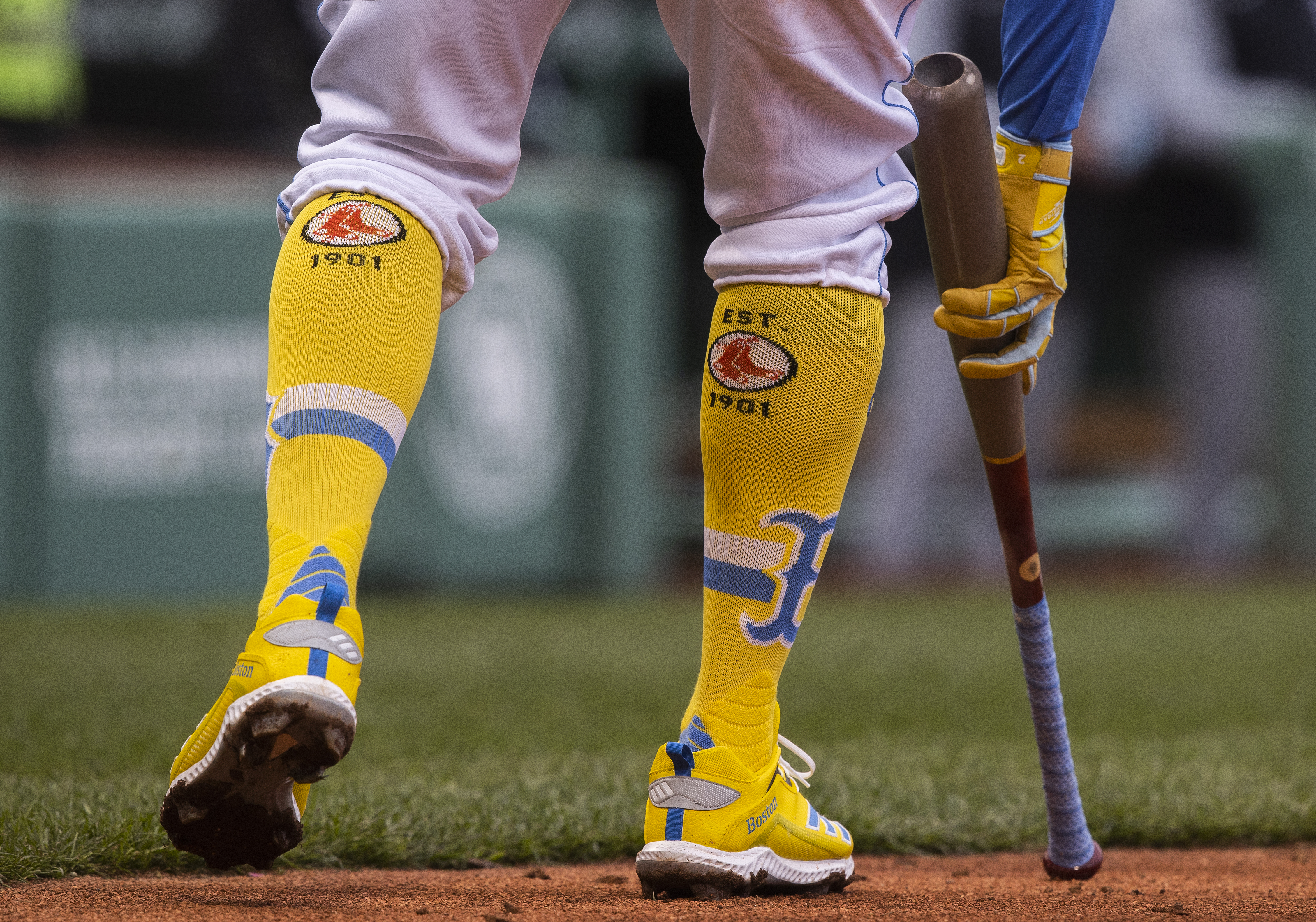 Xander Bogaerts stepped into the batter's box wearing the team's City Connect Boston Marathon-themed uniform.