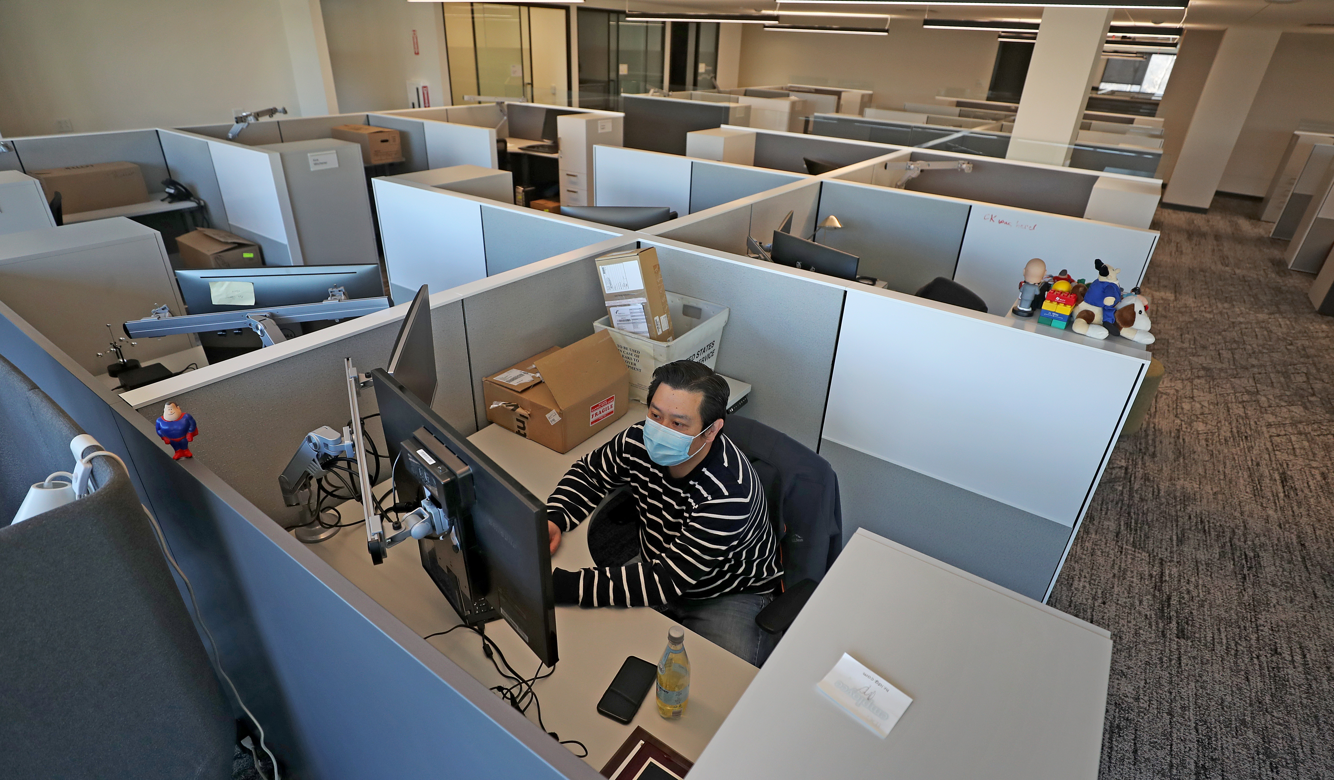 Ching Lee, an IDG employee, at his work station.
