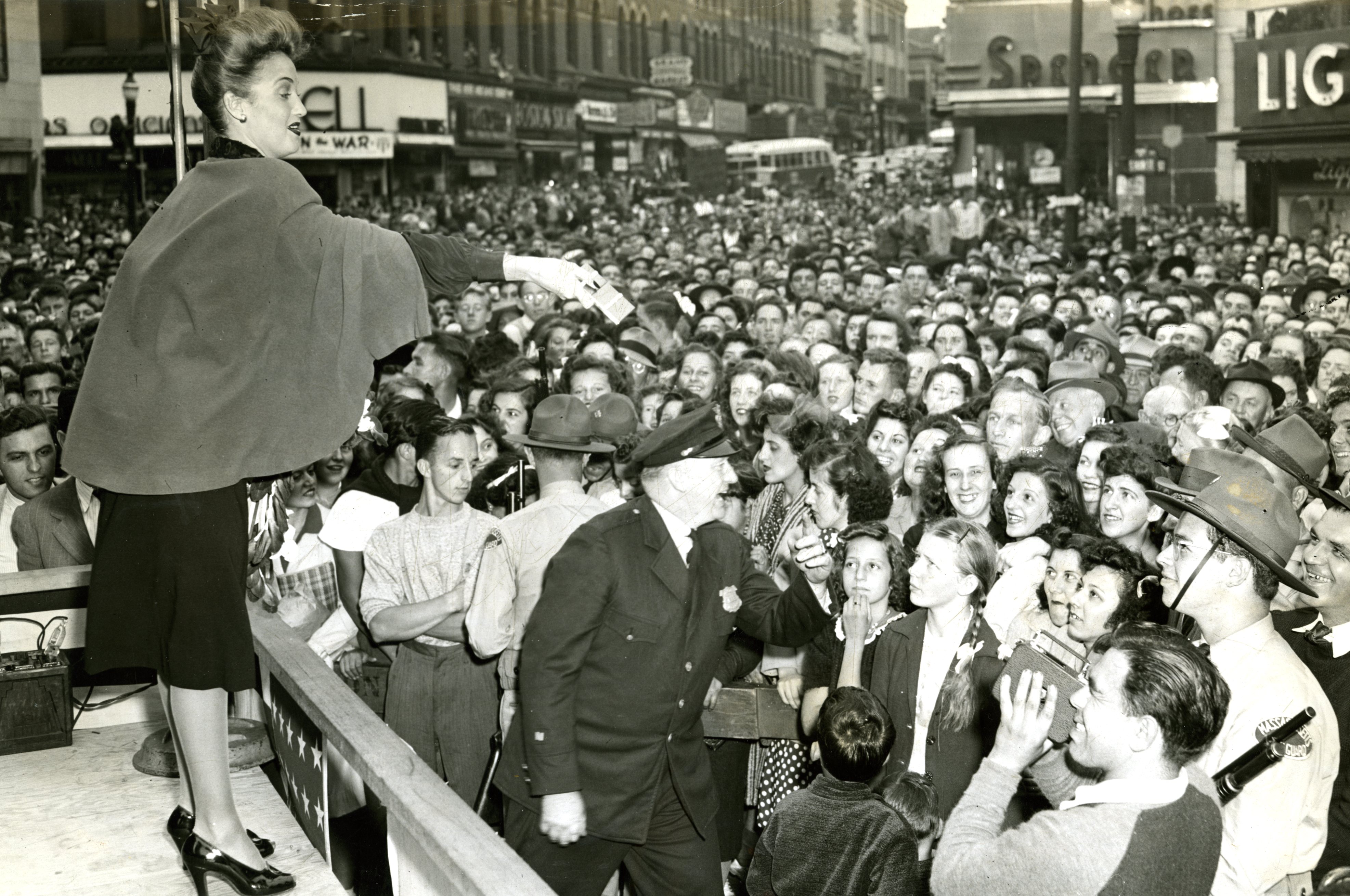 Actress Dorothy Lamour sold War Bonds at a rate of $22,204 per minute in Fall River on Sept. 11, 1942. She worked at the job of selling for three hours and took in $3,996,792. More than 25,000 persons jammed the streets surrounding City Hall to see her auction off a cigarette case for $11,000 in bonds. Later she dined at a fund-raiser at the Mellen Hotel and ended her day at the Wamsutta Mills, where 16,000 textile workers pledged $500,000 to the war effort.