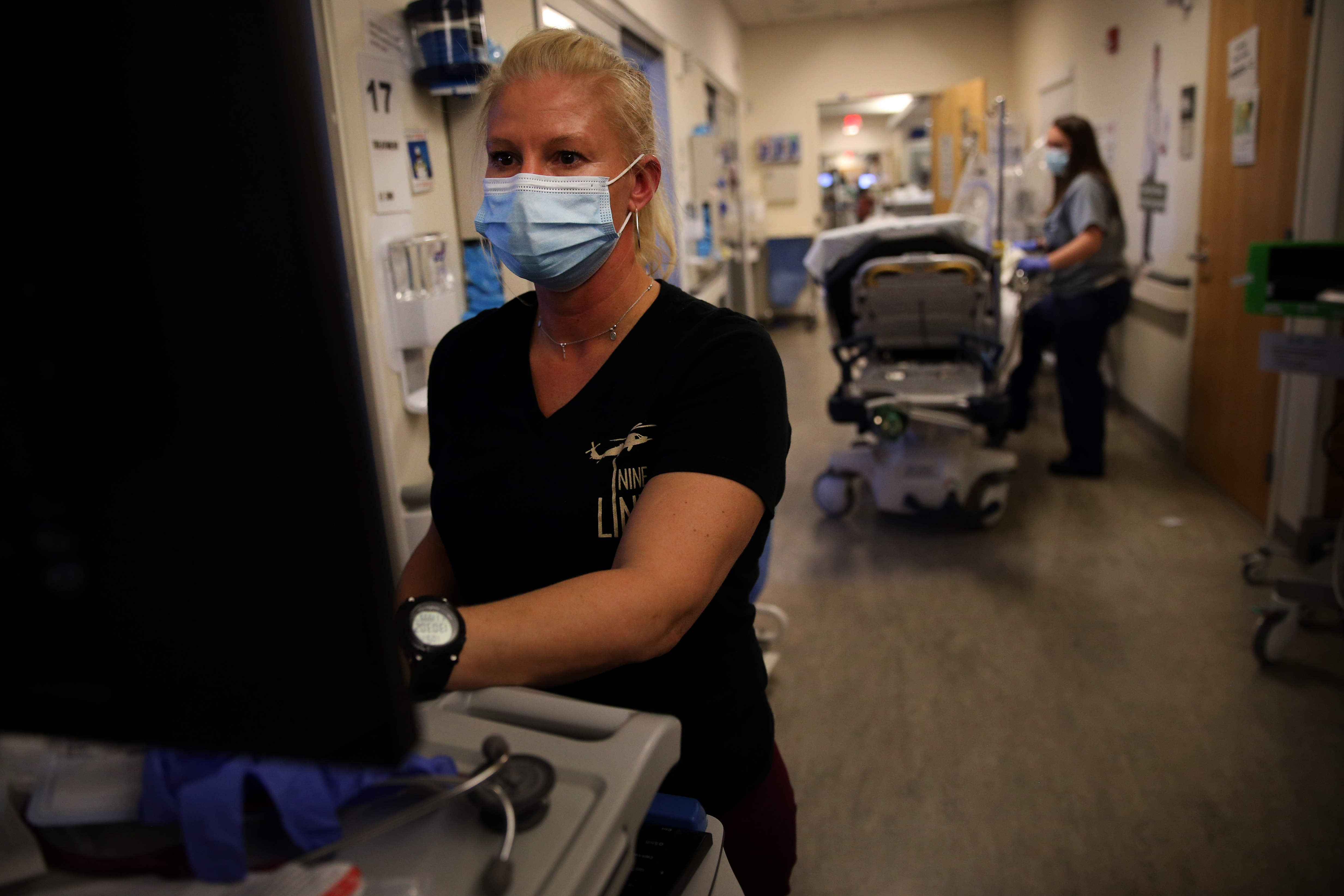 RN Nicole Kariko checks a patient's records in the emergency department at UMass Memorial Medical Center in Worcester.