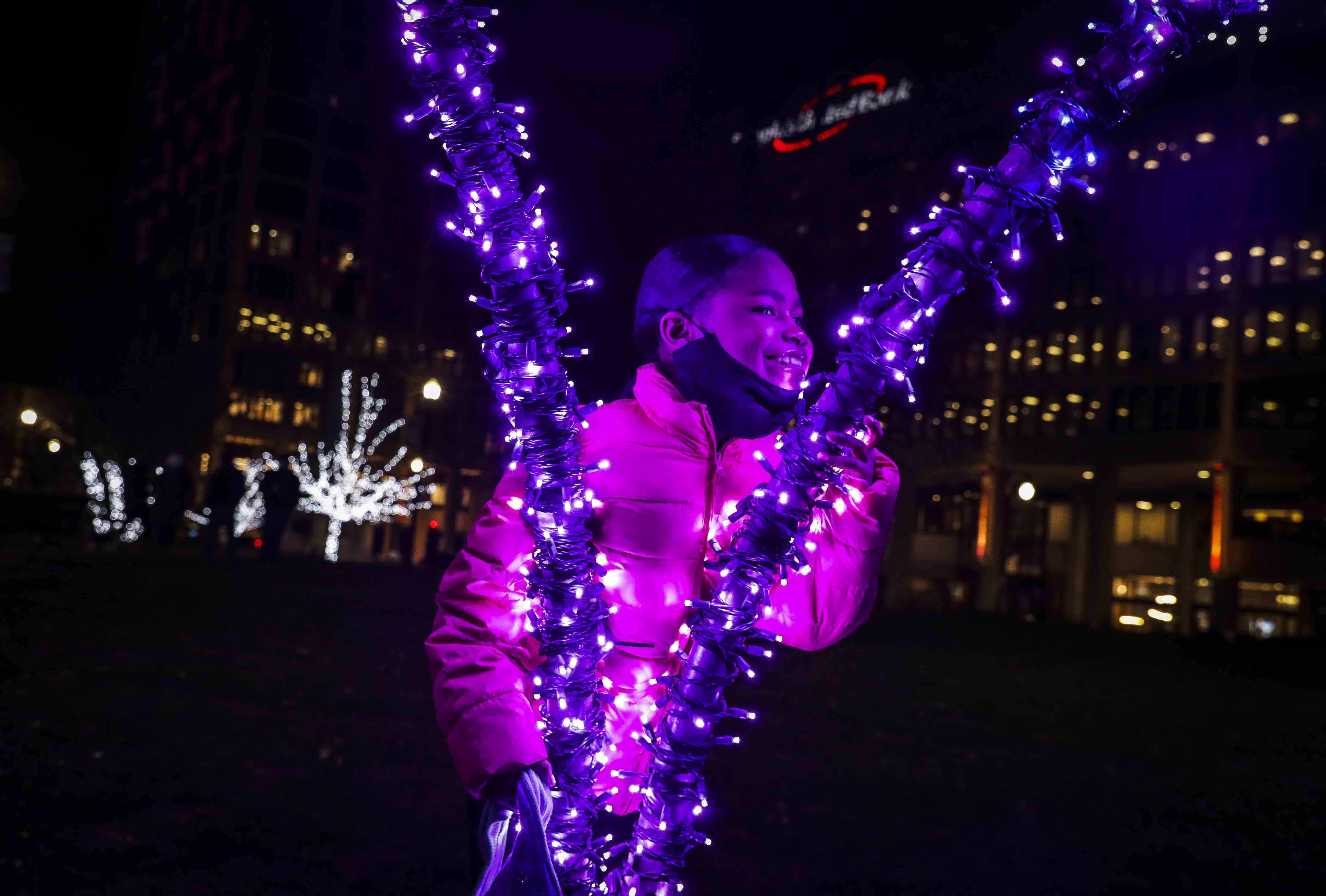 Yidania Infante,8, had her picture taken in a light tunnel in Worcester Common.