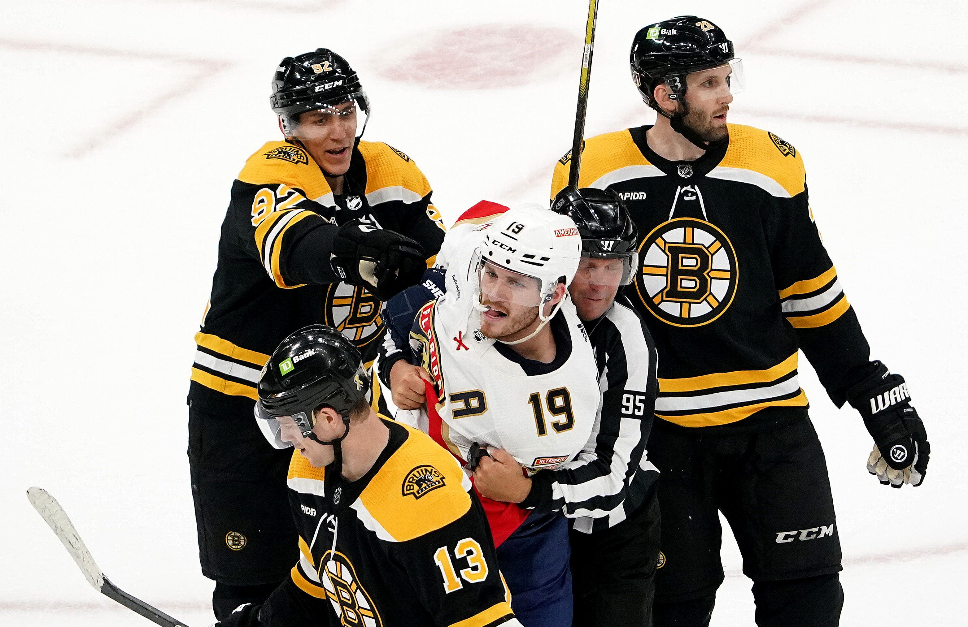 Brad Marchand Receives Helmet Popping Cross Check From Pavel