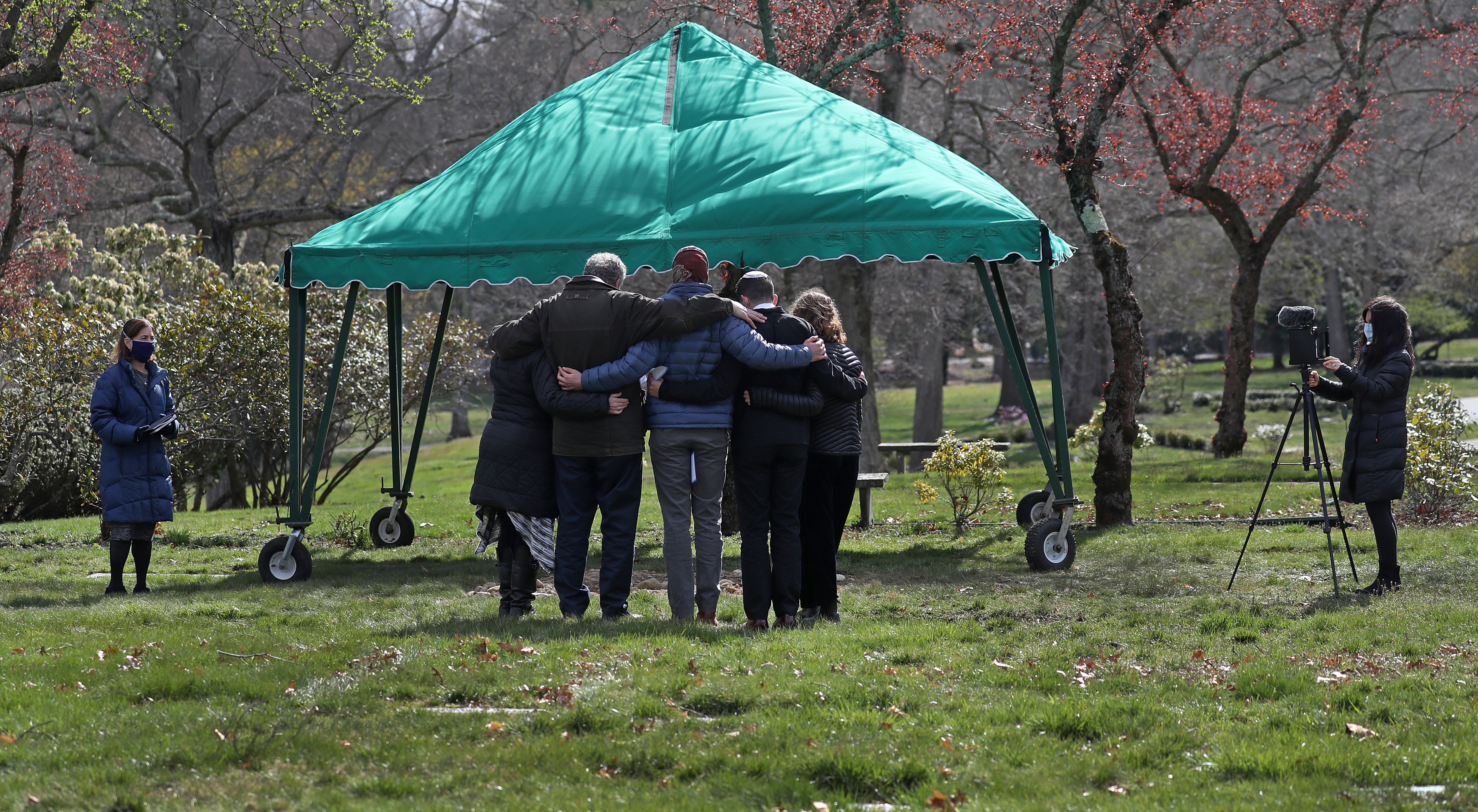 SHARON, MA - 4/16/2020: At Sharon Memorial Park in Sharon, the funeral services of Bernard Seckler, 95 yrs old and his wife Eveyln Seckler, 94 yrs old, they passed away on April 10th for the husband and wife days later on April 13th at The Falls at Cordingly Dam, an assisted living community in Newton. They both died of teh COVID-19 coronavirus. The new norm funeral during the COVID-19 coronavirus pandemic. The funeral was attended by the son and his family members with others watching including the sister in California by a live funeral video provided by Marcy Hirschen a mortuary student. Under normal times this funeral service would have been attended by over 150 mourners. (David L Ryan/Globe Staff )