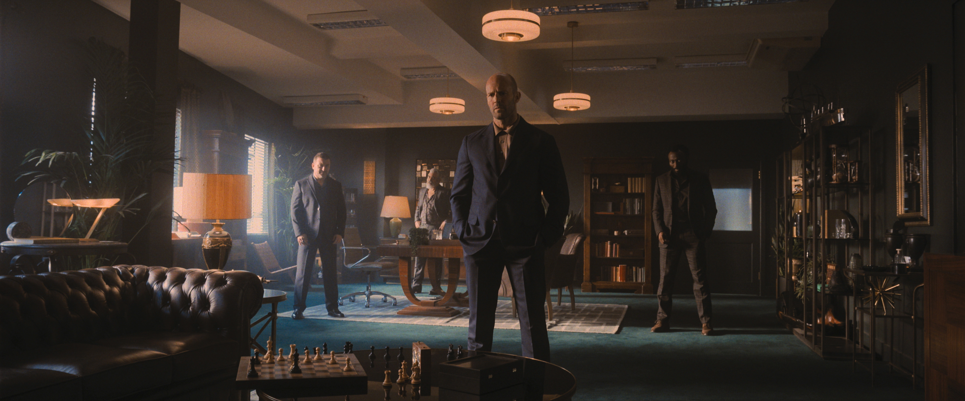 Jason Stathan, center, with, left to right, Cameron Jack, Darrell D'Silva, and Babs Olusanmokun in "Wrath of Man."