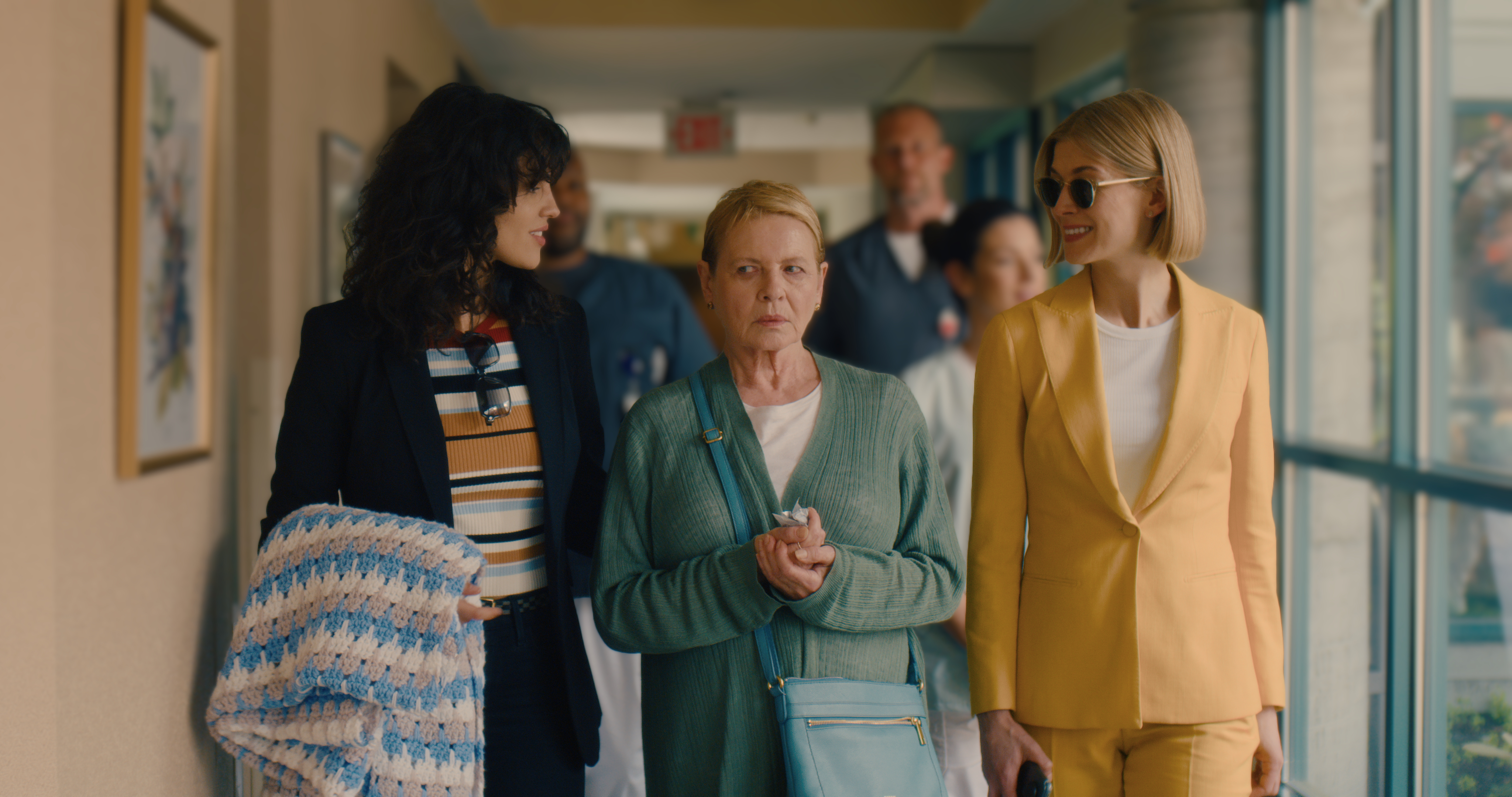 From left, Eiza González, Dianne Wiest, and Rosamund Pike in "I Care a Lot."