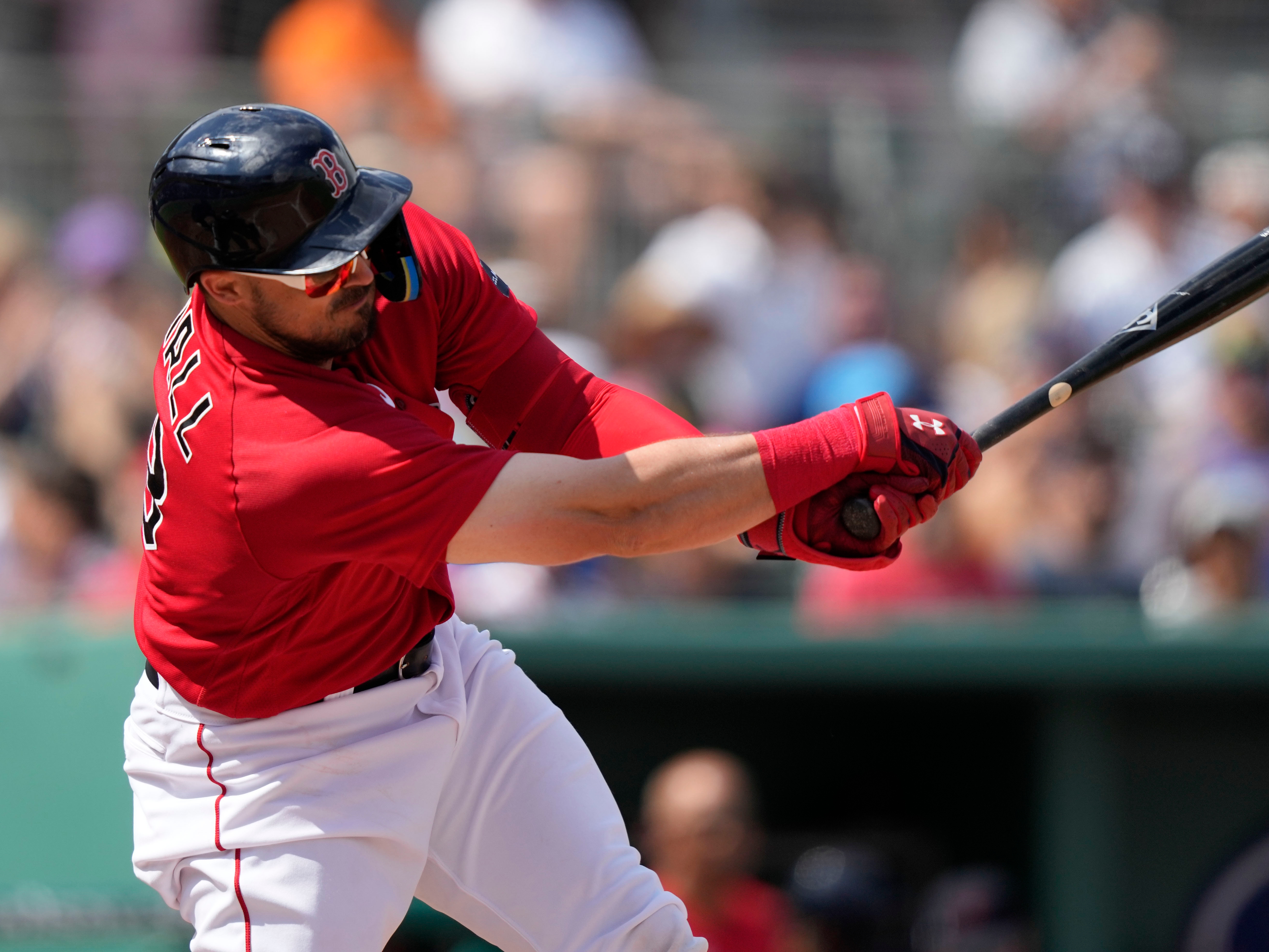 Dustin Pedroia helps out at Red Sox spring training