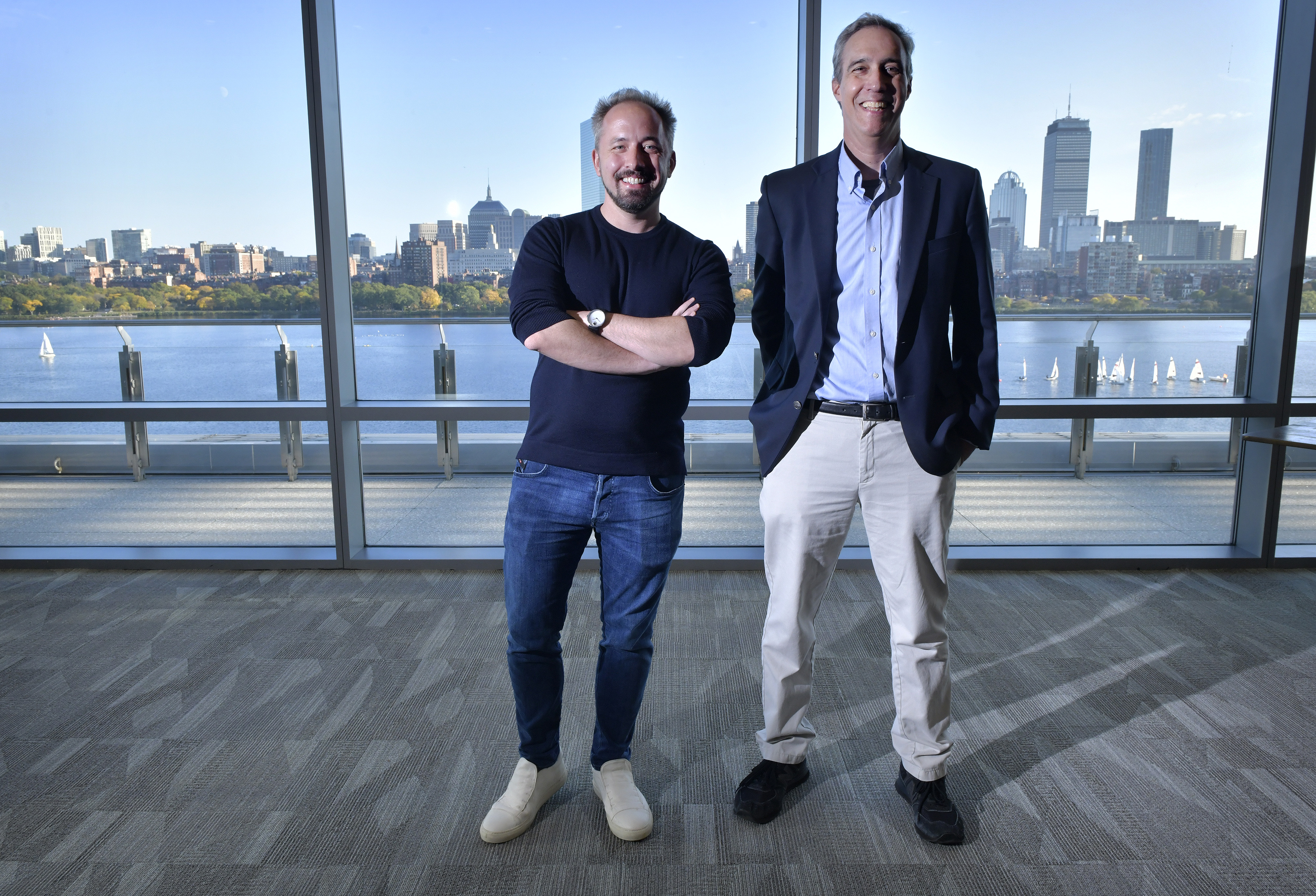 Left to right, Dropbox CEO and Co-Founder Drew Houston and Daniel Huttenlocher, Dean of MIT Schwarzman College of Computing, in an interview at MIT's Samberg Conference Center. 
