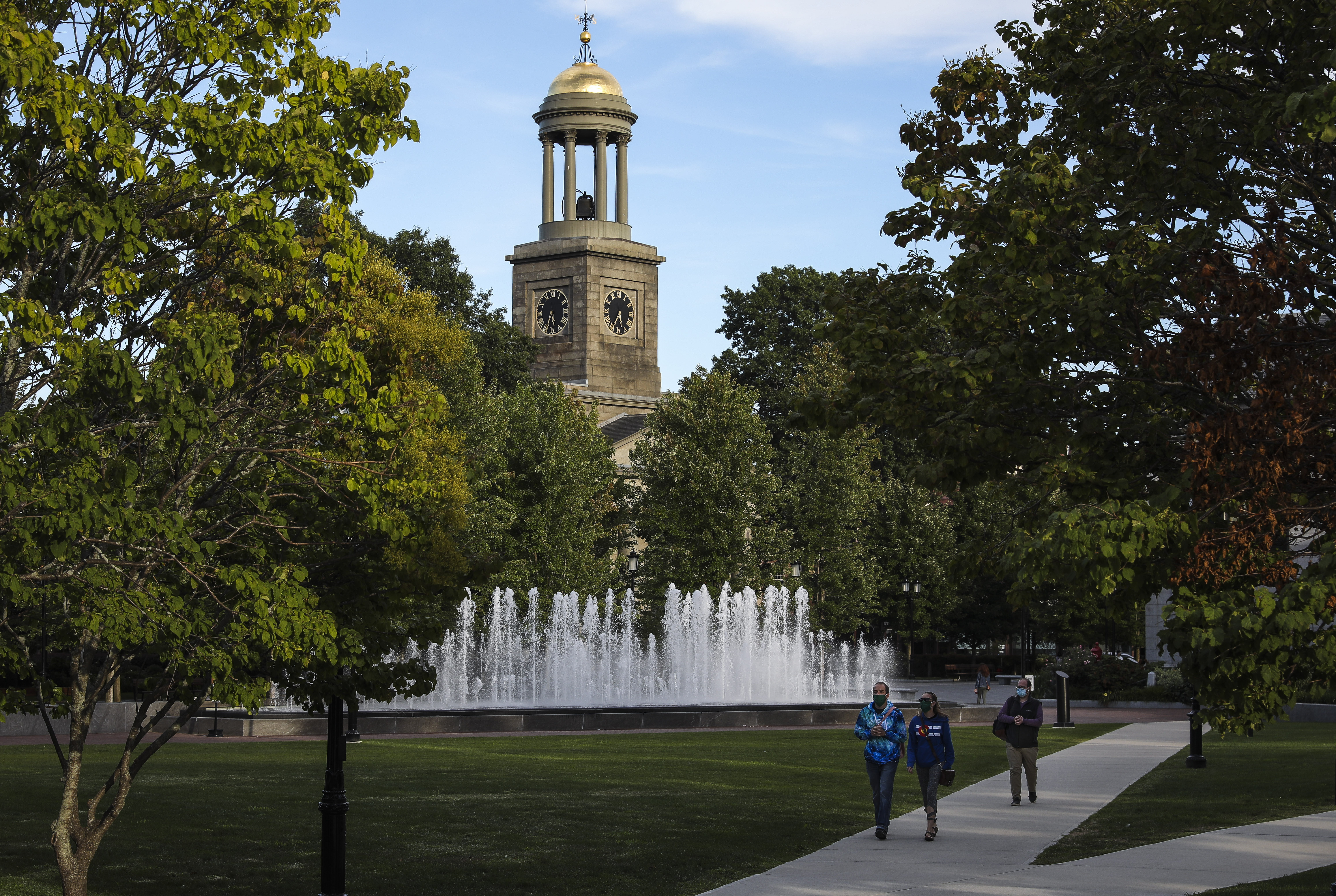People walk through Quincy Square in Quincy Center.