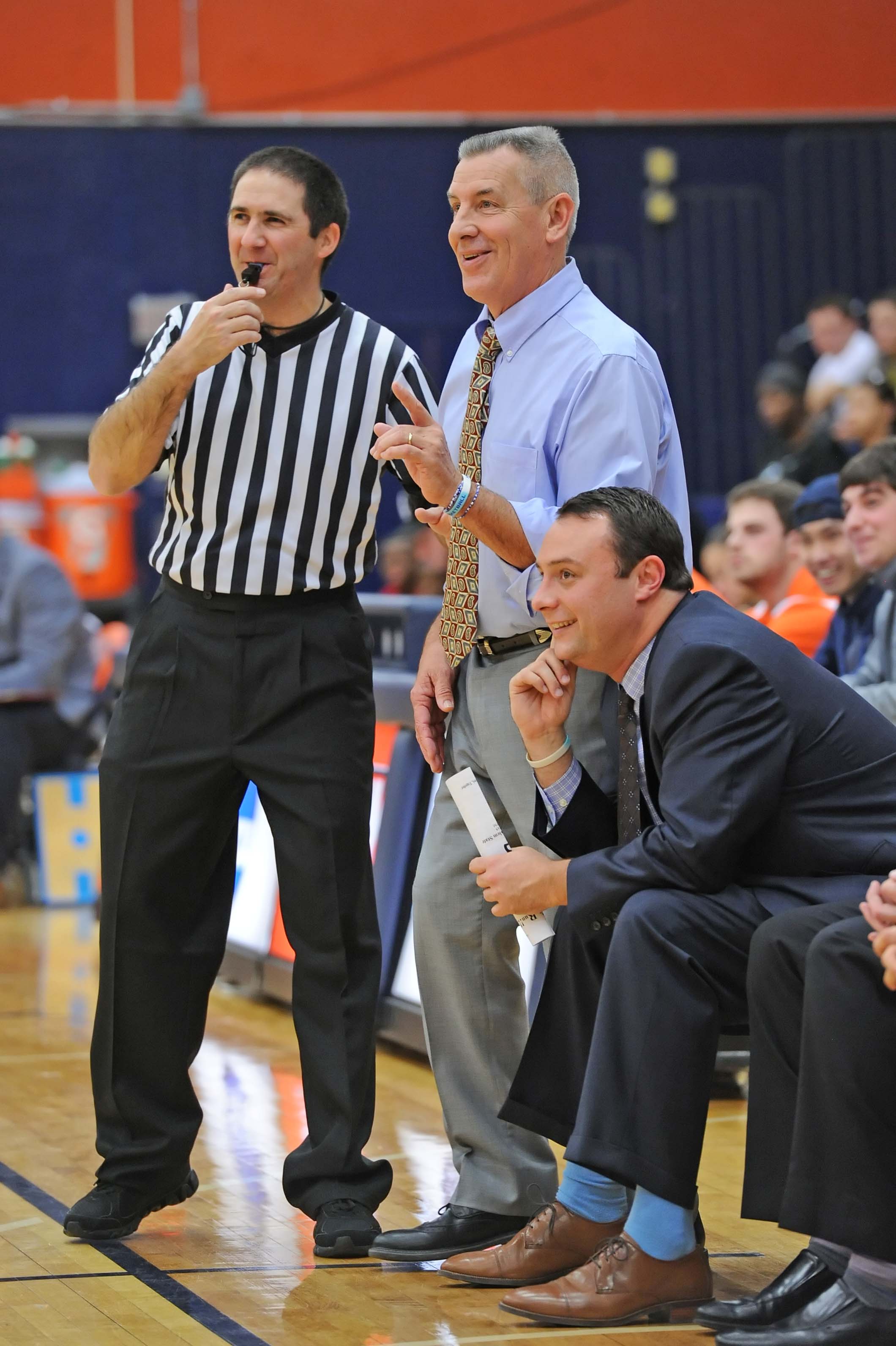 Bob Sheldon (center) is retiring as the men's basketball coach Tufts University after 32 seasons and 483 victories.