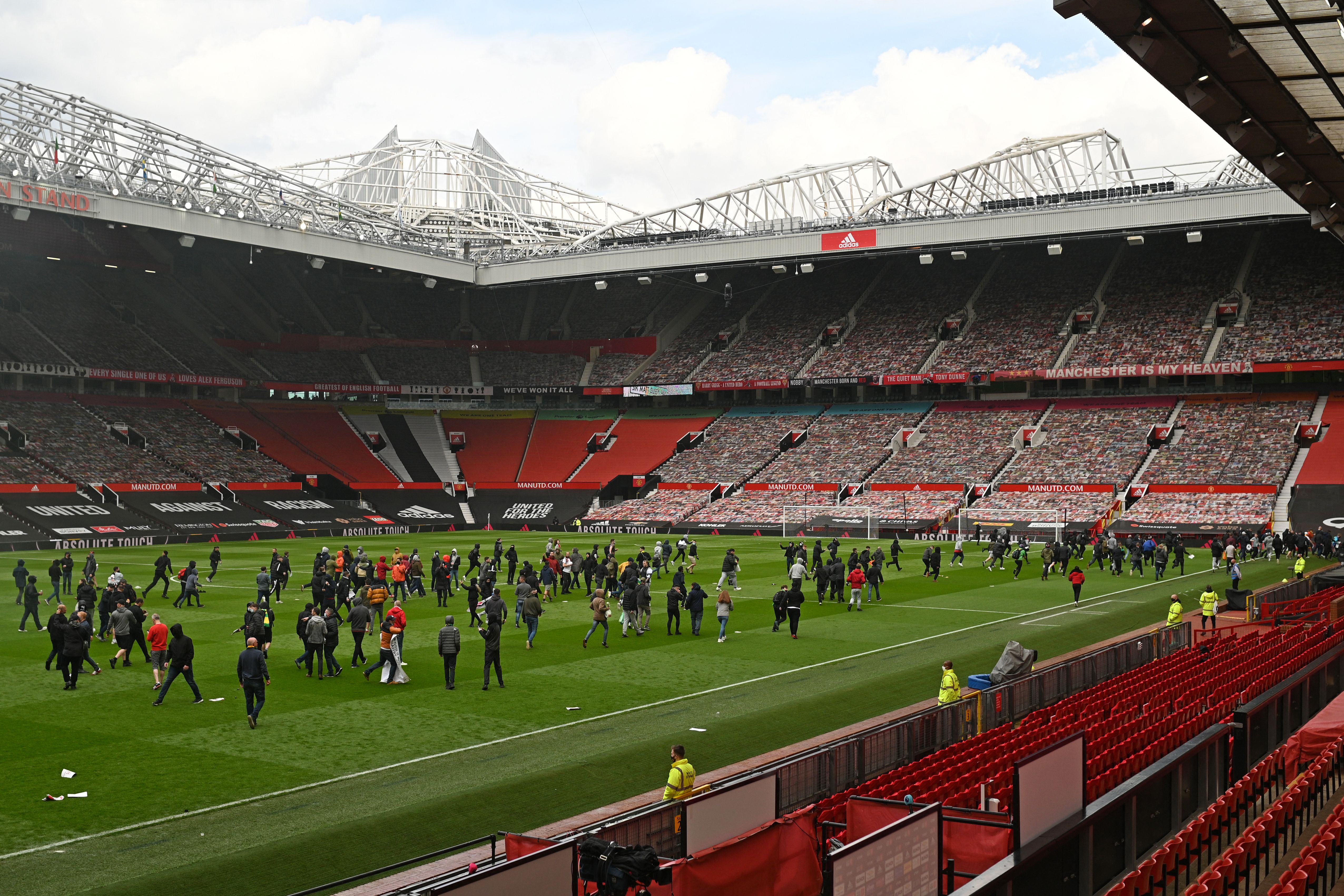 Supporters protest against Manchester United's owners inside Old Trafford Stadium on Sunday.