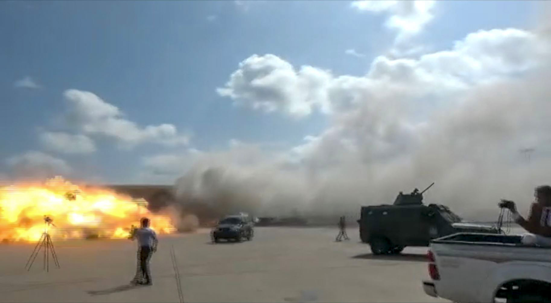 A still image from video showed the explosion at the Aden Airport in Yemen Wednesday.