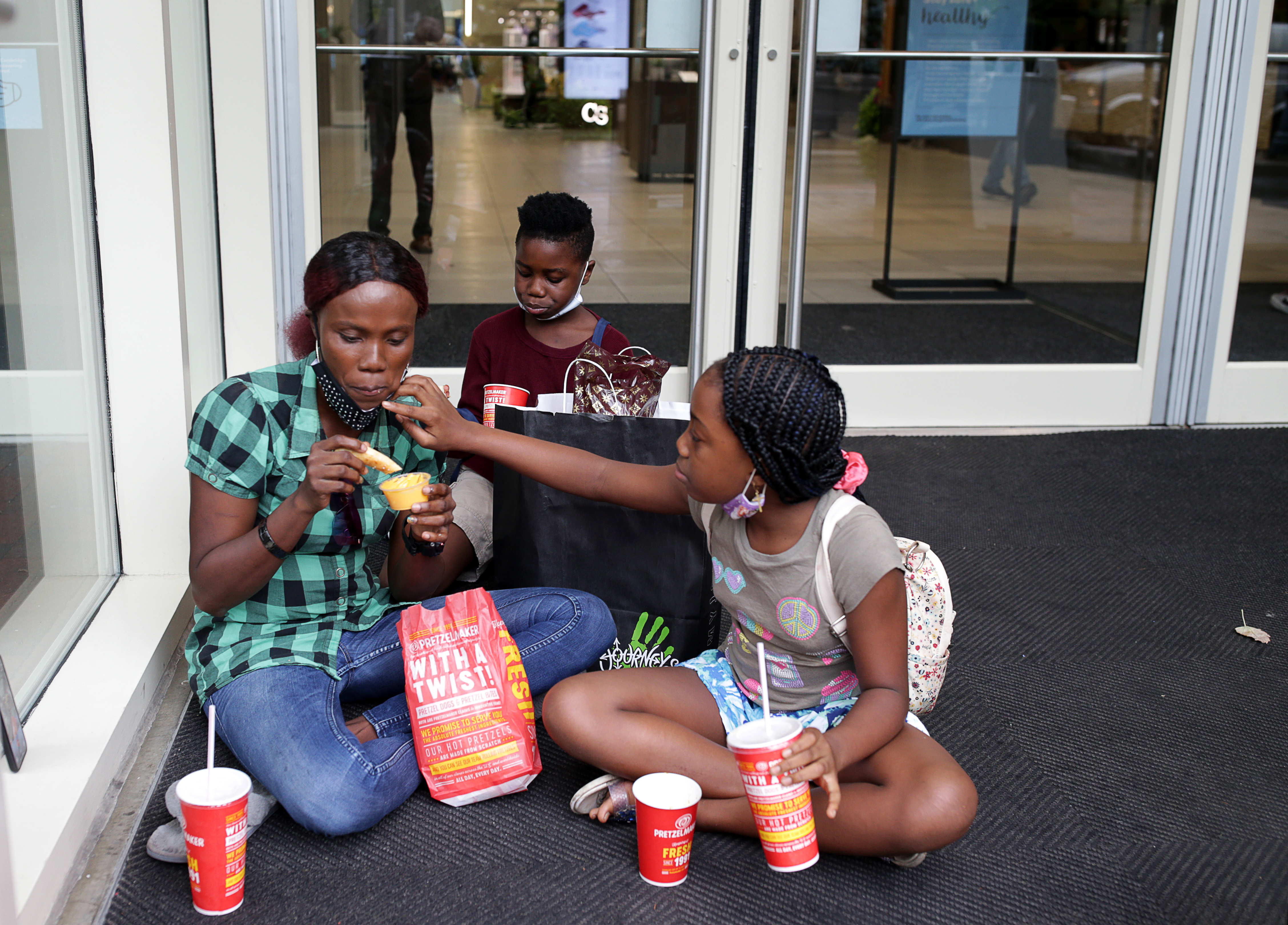 Marie Darline had a lunch break with her children Stevenson and Stevenda at CambridgeSide.