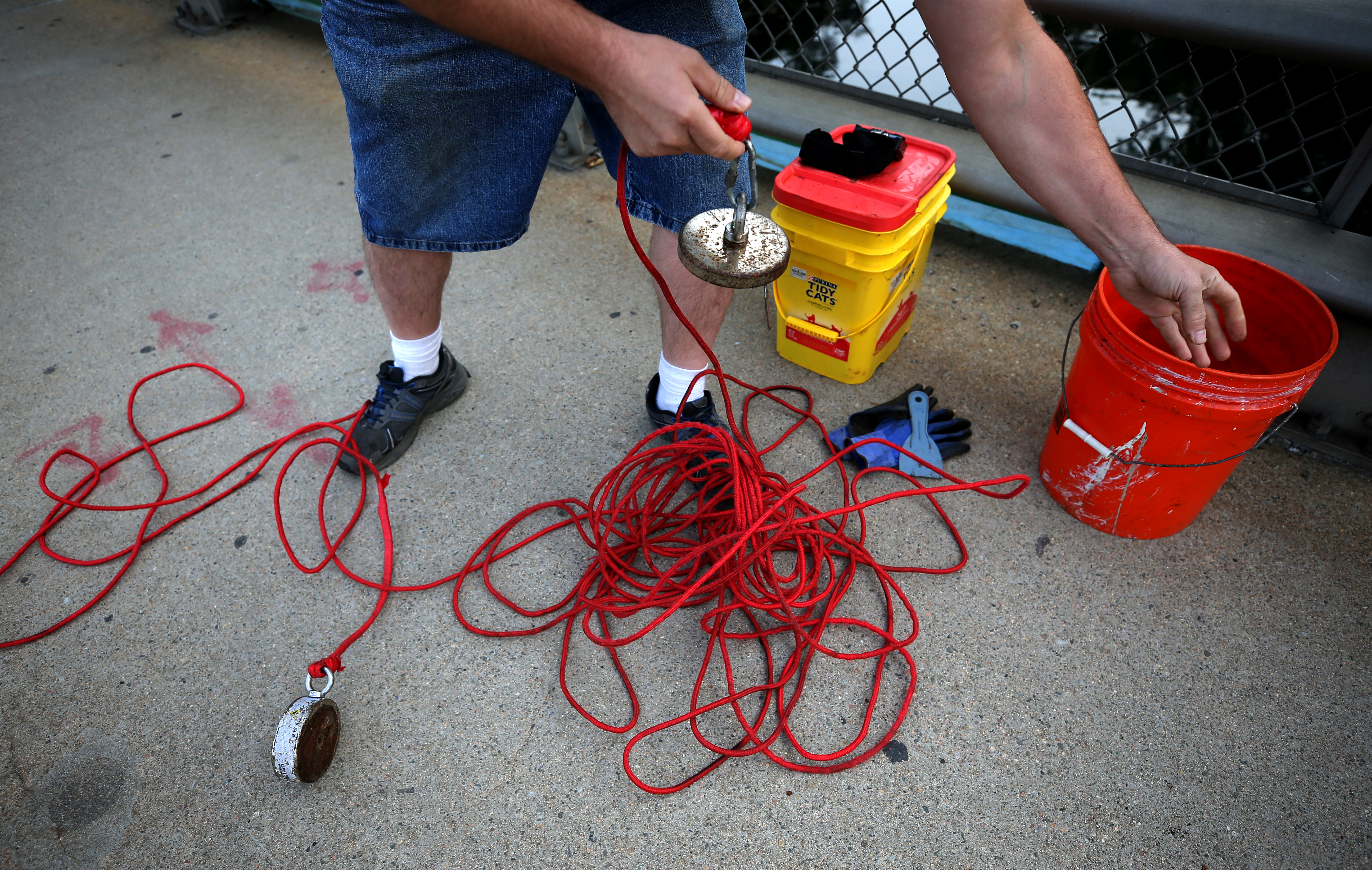 Martell unraveled his lines and collected his discoveries in a bucket.