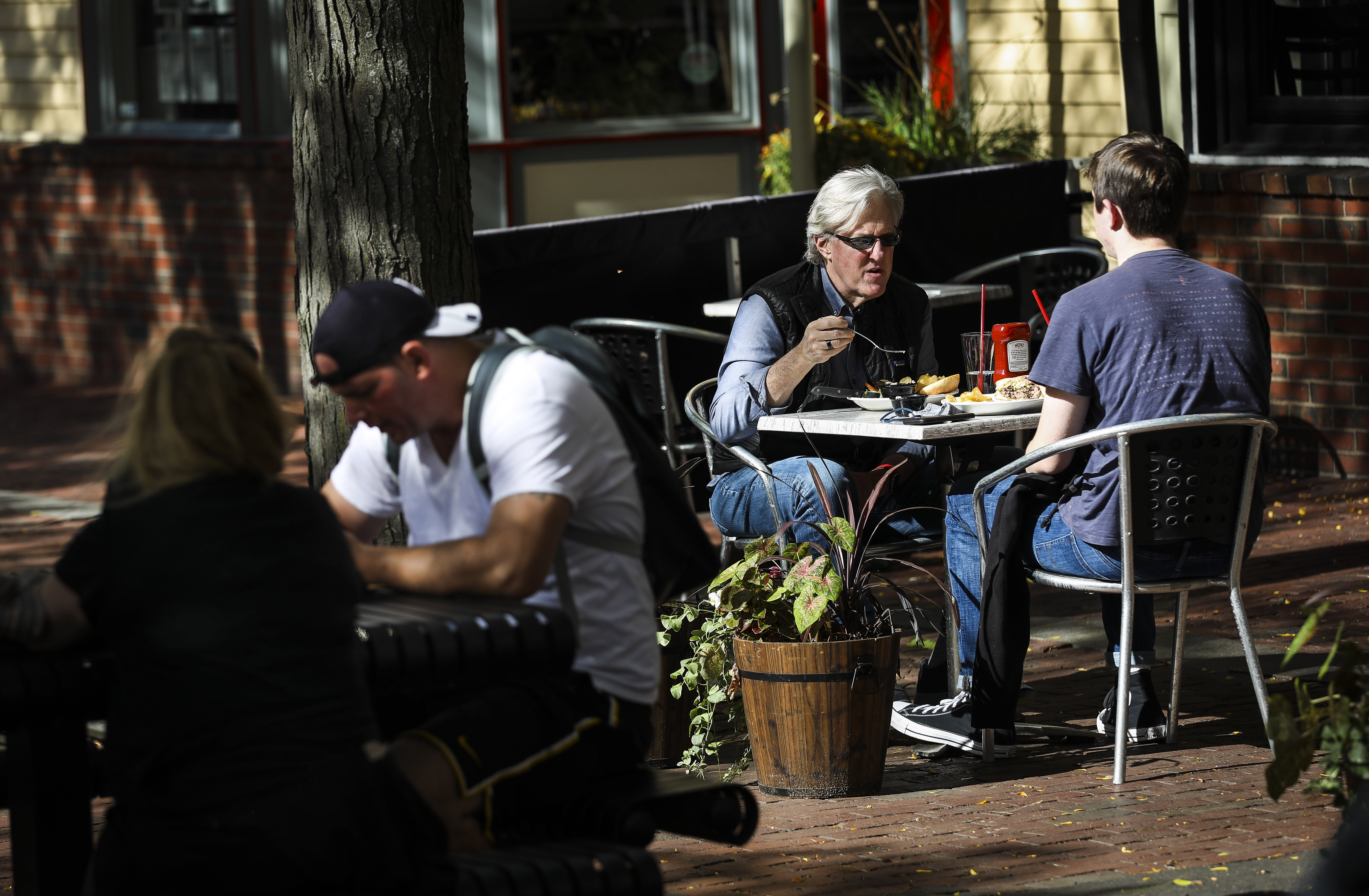 Diners ate outside in Davis Square on Thursday afternoon.