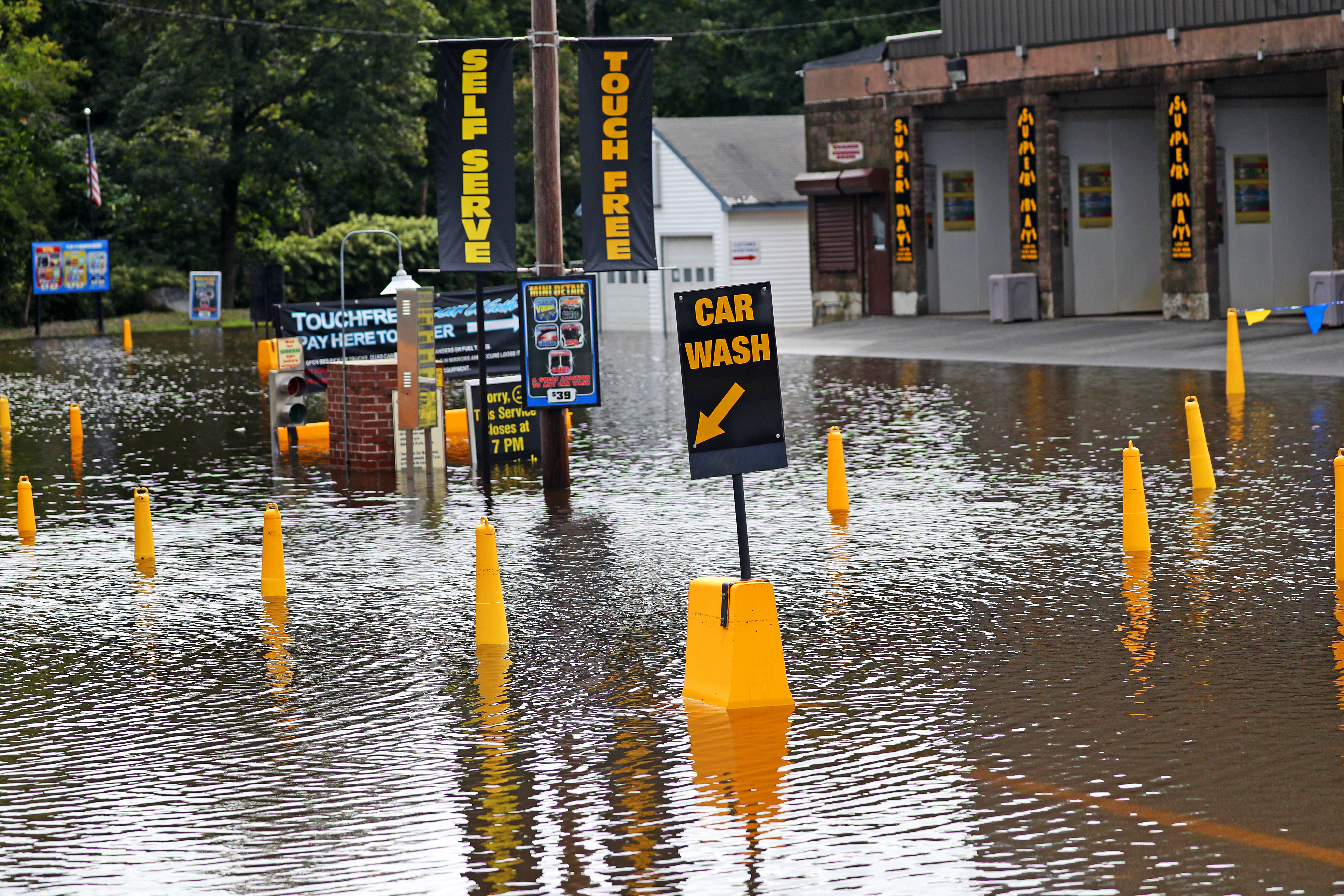 A flooded car wash off Lexington Street in Waltham.