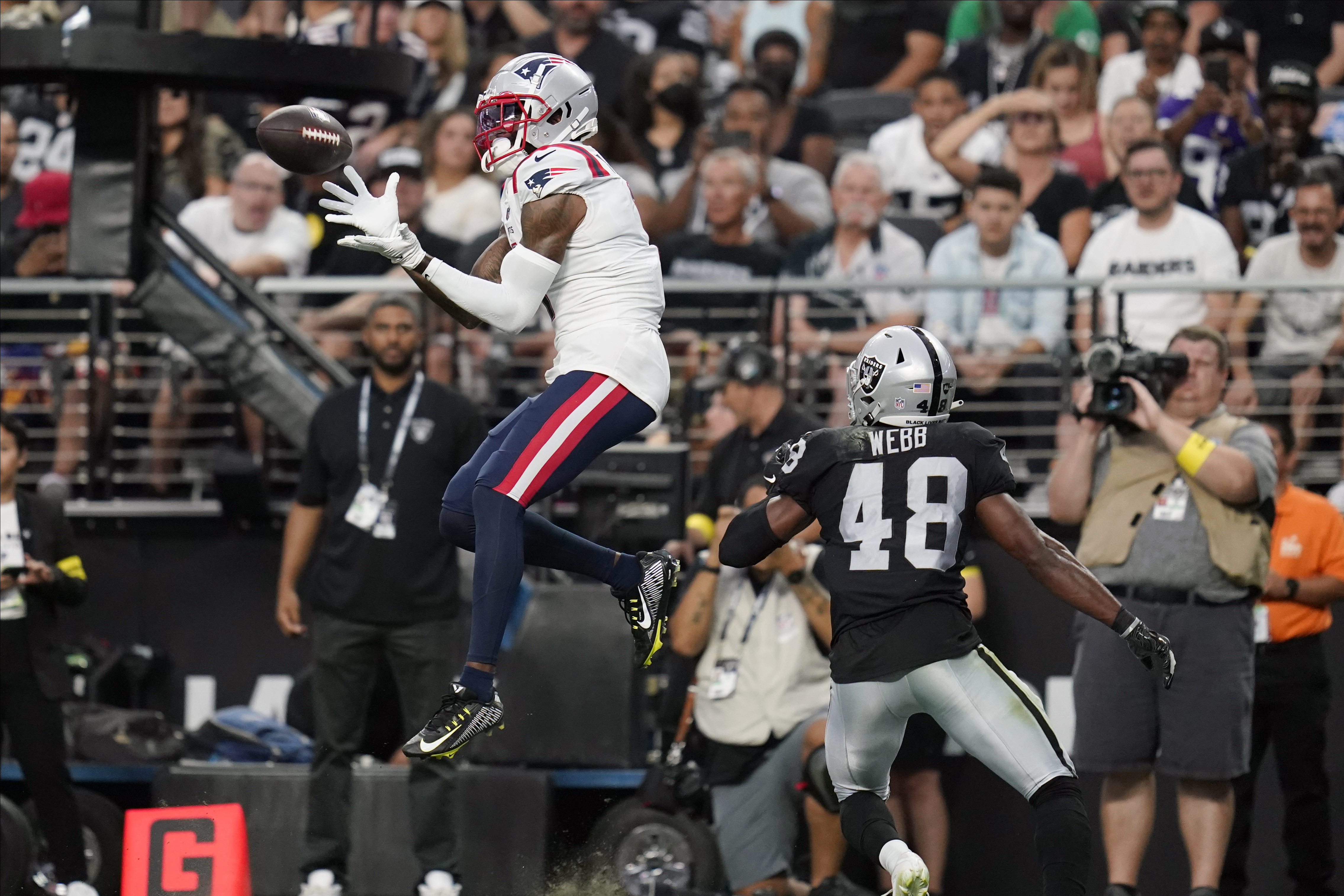 New England Patriots wide receiver DeVante Parker (1) runs a route during  the first half of an NFL football game against the Chicago Bears, Monday,  Oct. 24, 2022, in Foxborough, Mass. (AP