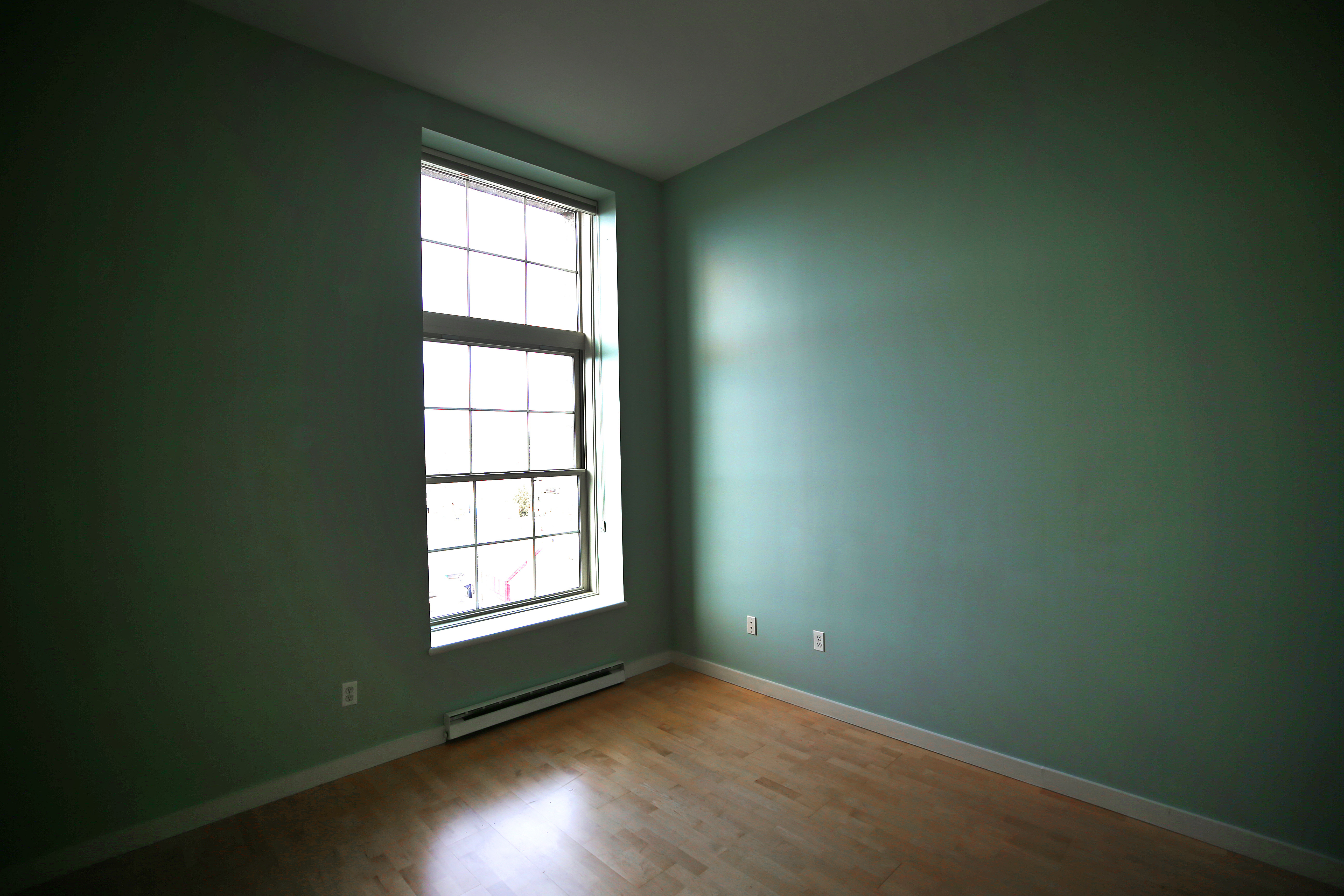 BOSTON, MA - 1/06/2021: 011721HOMEOFTHEWEEK....View of bedroom. Home of the Week is of an apartment for rent on the fourth floor of the old Charlestown High School in Boston. A small unit that has decorative walls and high ceilings because it used to be part of the auditorium. (David L Ryan/Globe Staff ) SECTION: BUSINESS