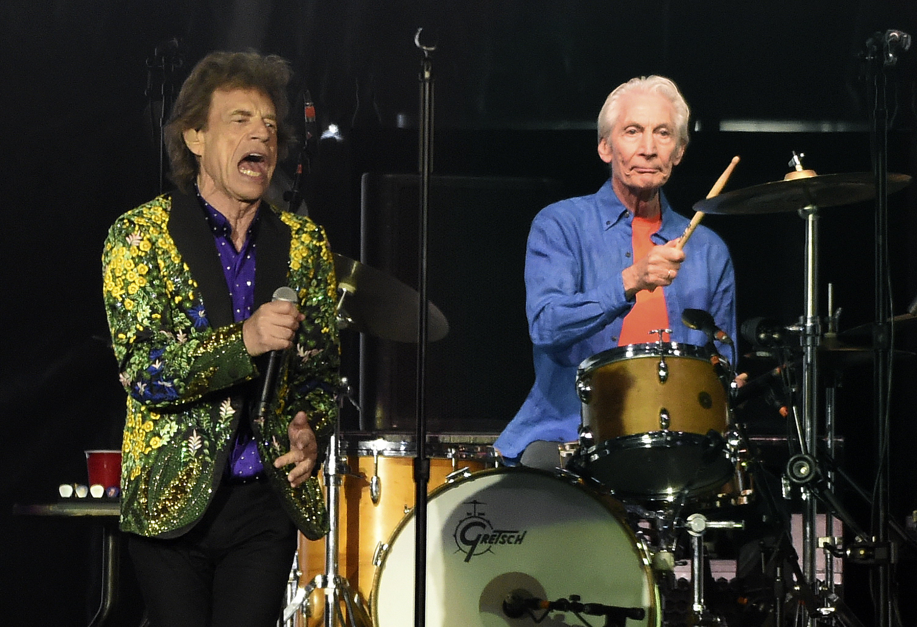 Mr. Watts performed behind singer Mick Jagger during a concert at the Rose Bowl in 2019.