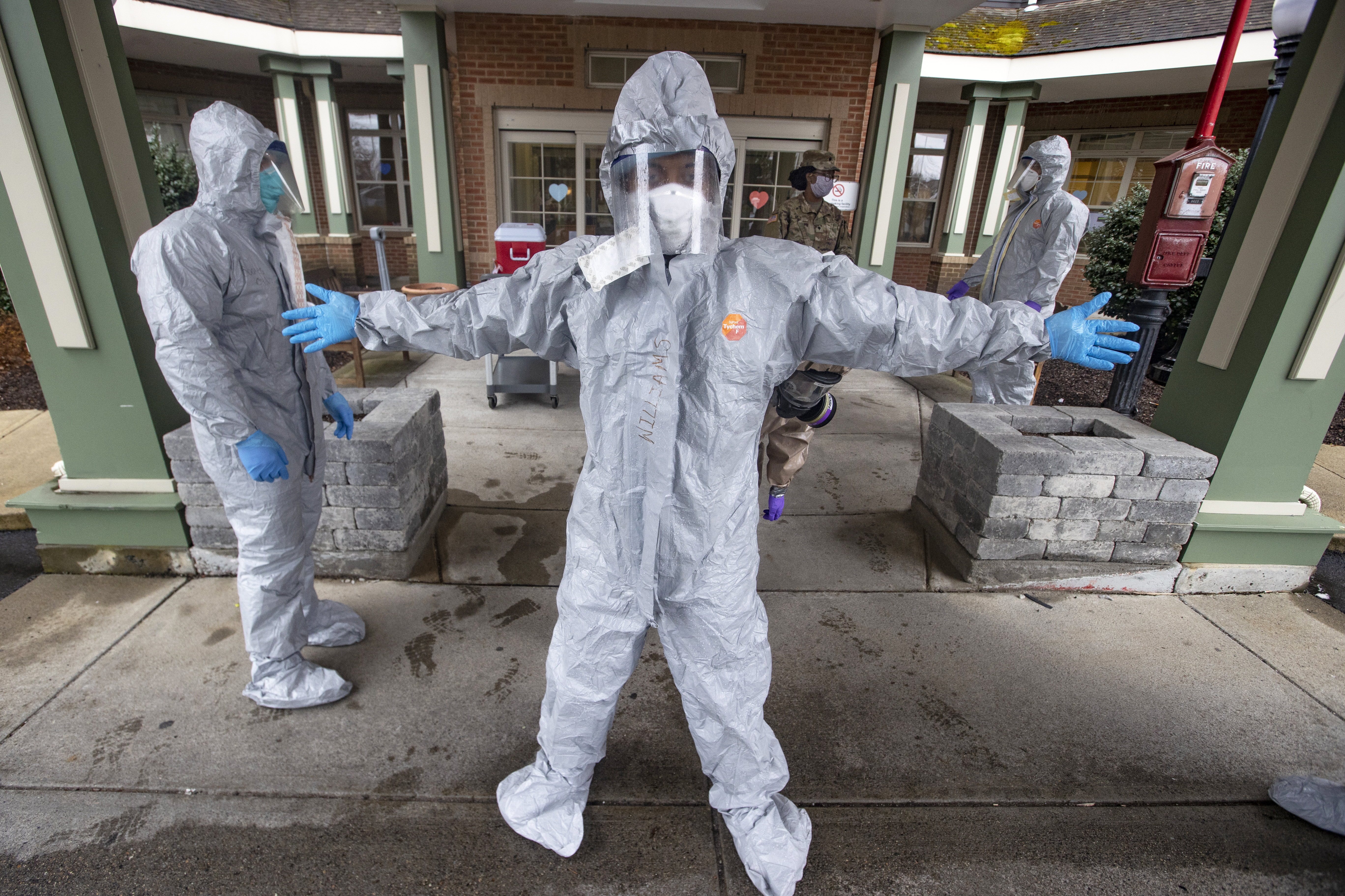 Quincy, Ma April 9, 2020 - The Massachusetts National Guard removes their hazmat suits after leaving Alliance Health at Marina Bay. The National Guard was deployed to Quincy to assist nursing homes with COVID-19 testing. According to their website 