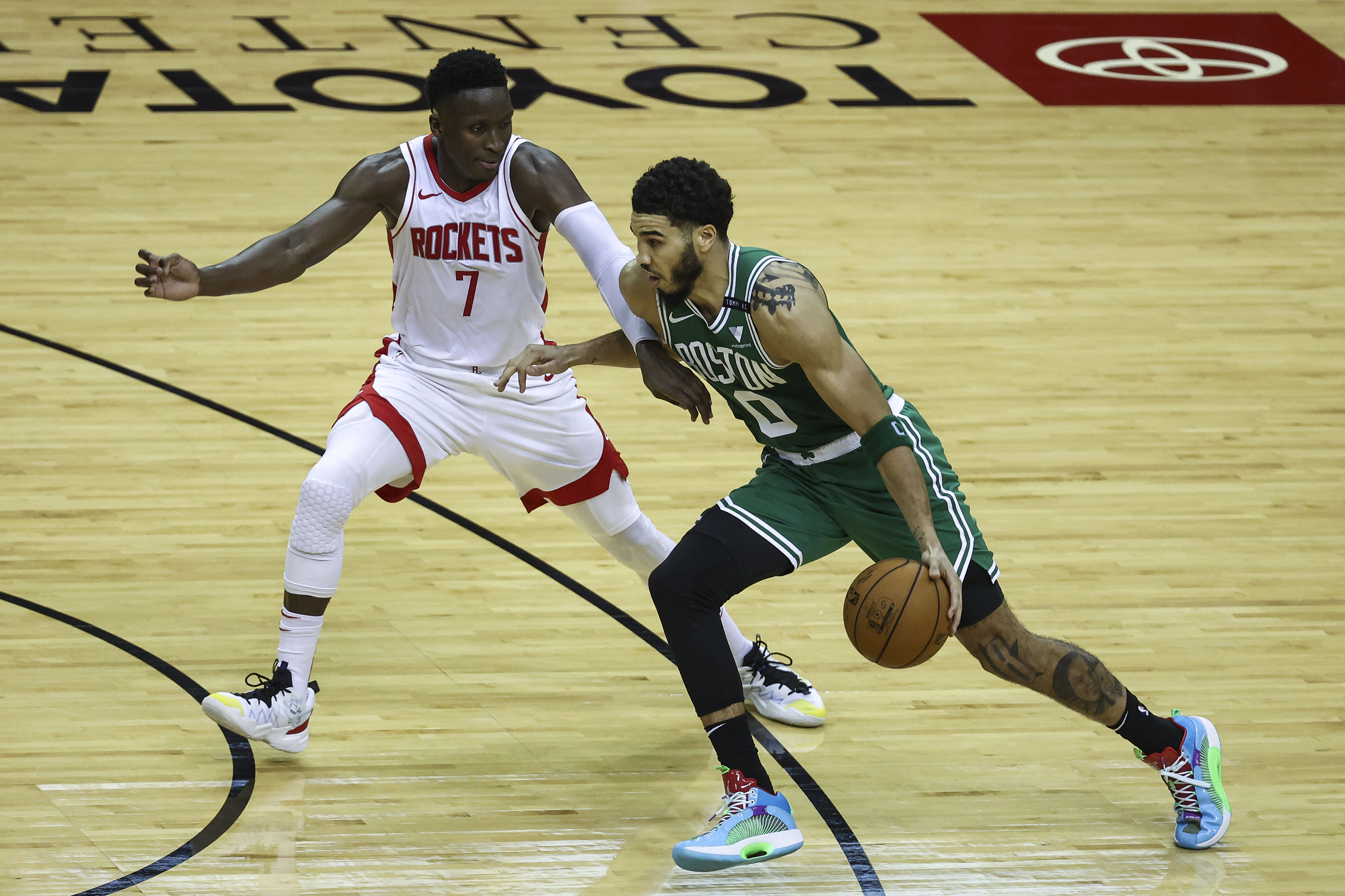 Jayson Tatum dribbles past Houston's Victor Oladipo during the third quarter of Sunday's win.